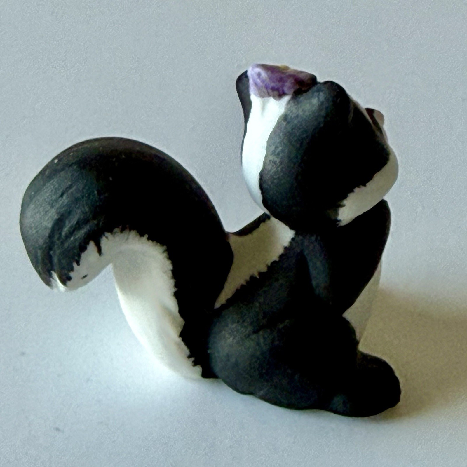 VNTG Mini Porcelain SKUNK Figurine Hand Painted Matte Finish w/Flower Mid-Centur