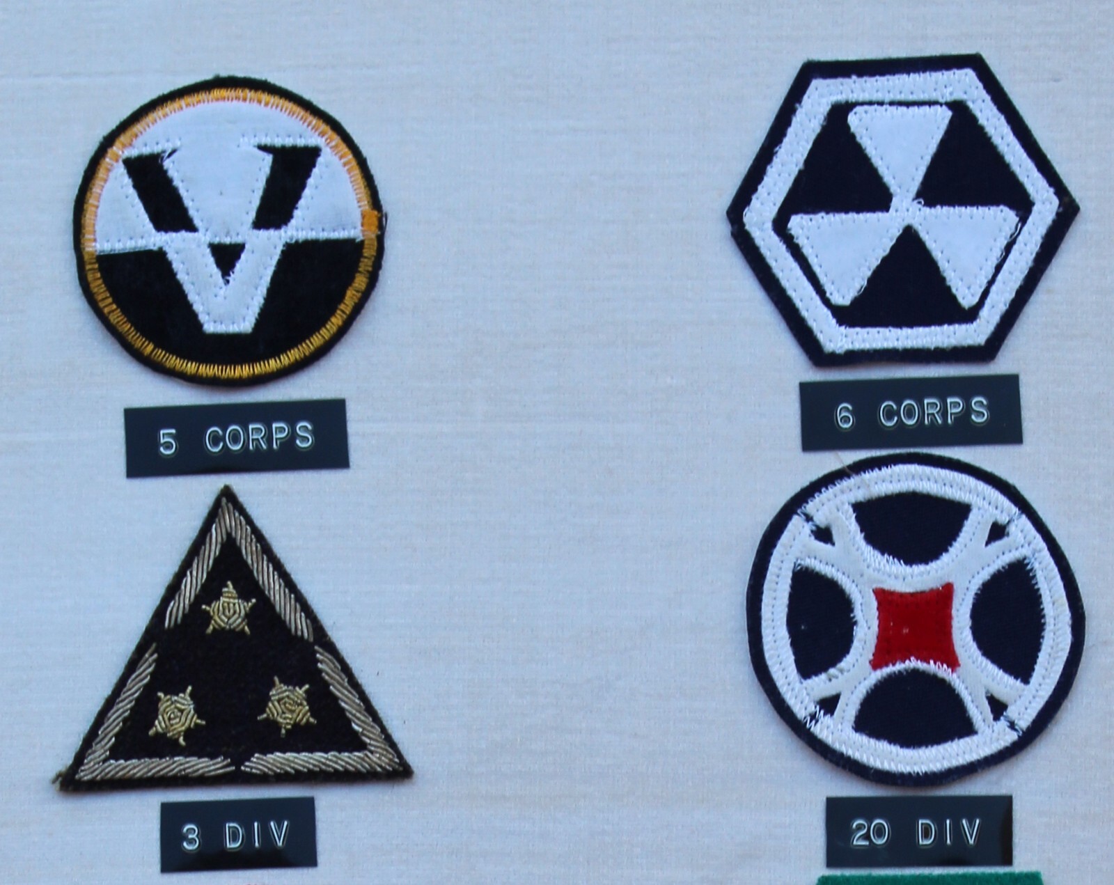 23 REPUBLIC OF KOREA (ROK) DIVISION PATCHES MOUNTED IN A FRAME
