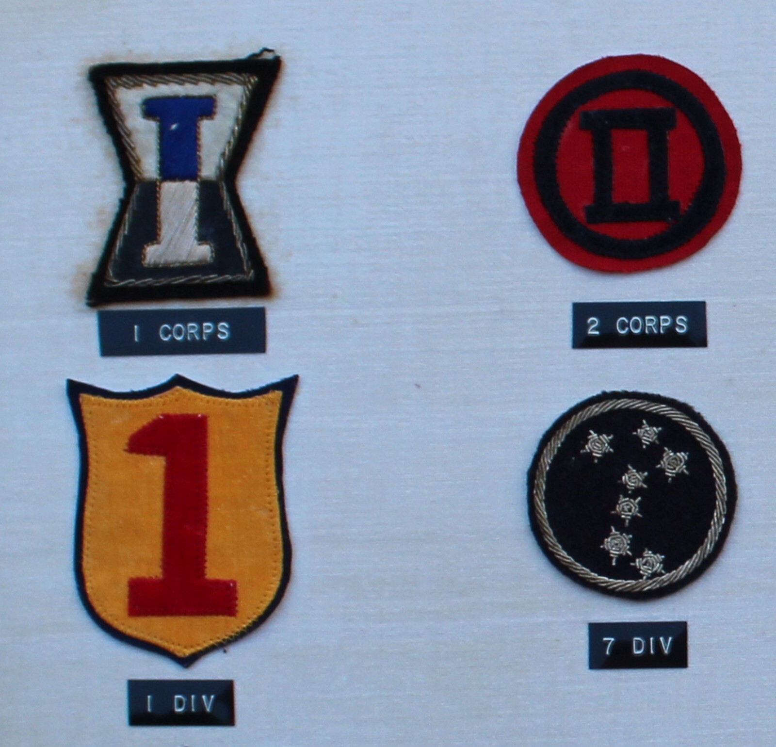 23 REPUBLIC OF KOREA (ROK) DIVISION PATCHES MOUNTED IN A FRAME