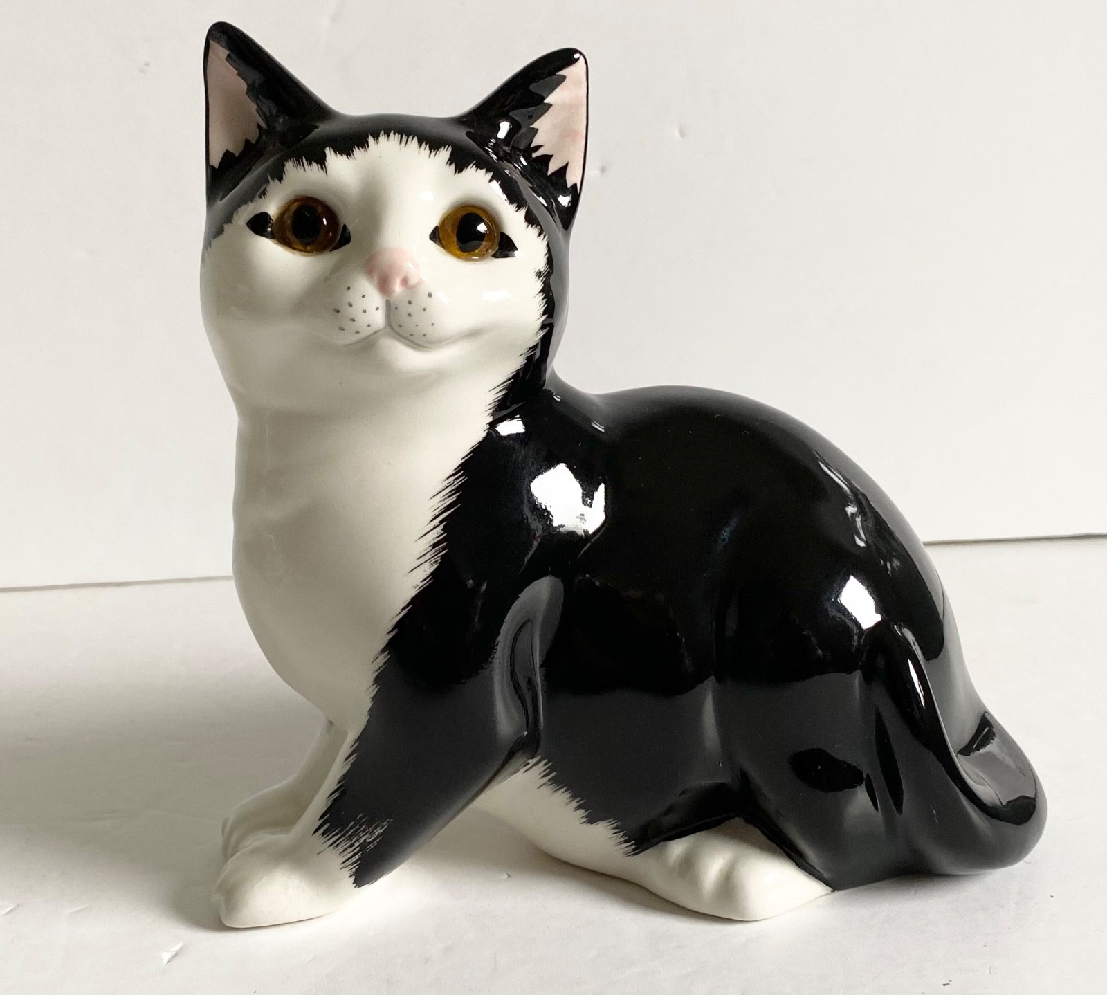 CAT FIGURINE CERAMIC BLACK & WHITE YELLOW EYES SITTING 6.25″ HIGH VINTAGE UK
