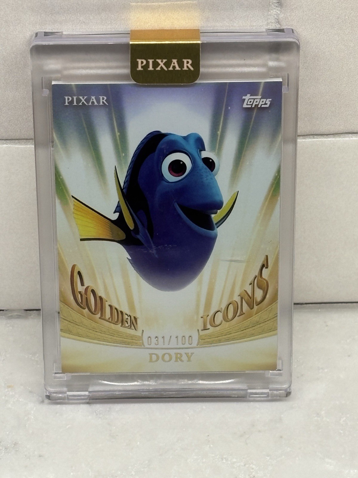 2024 Topps Pixar Gold; Dory; Golden Icons – Encased /100
