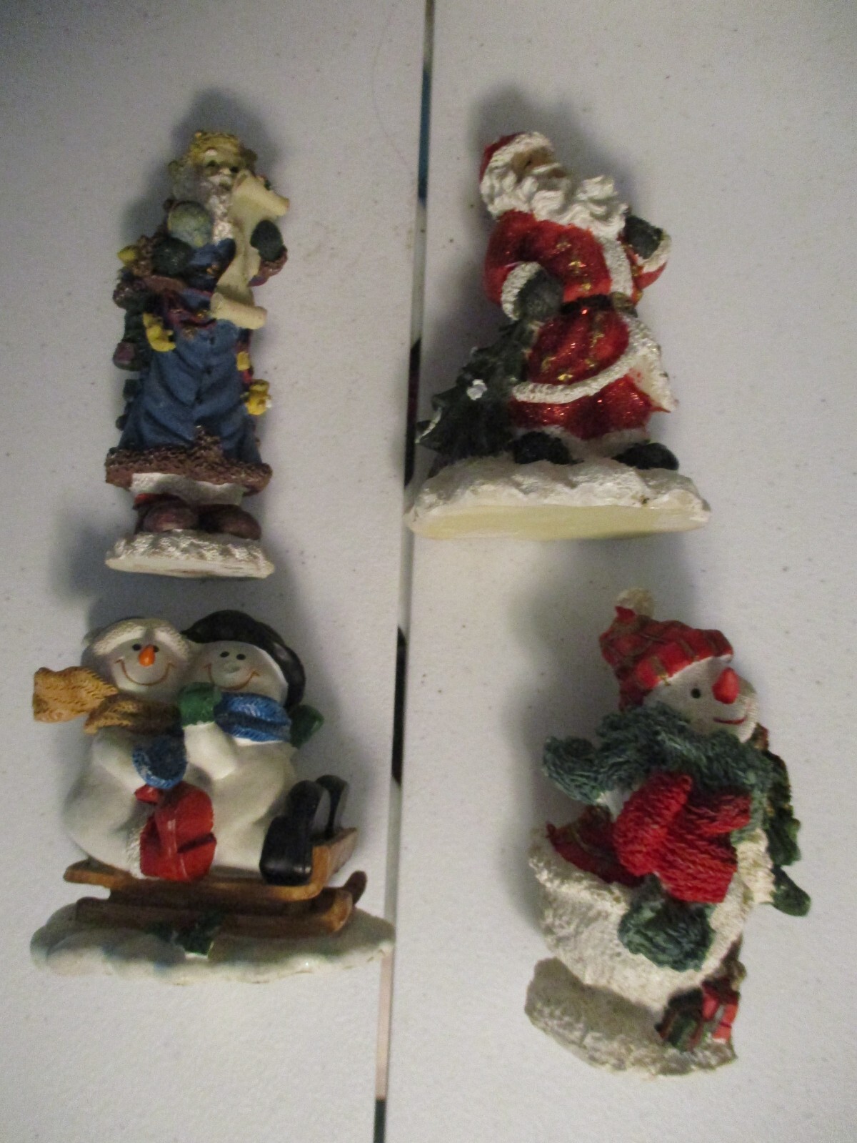 4 Unbranded Resin/Plastic Christmas Figurines 3″ to 5″ Tall