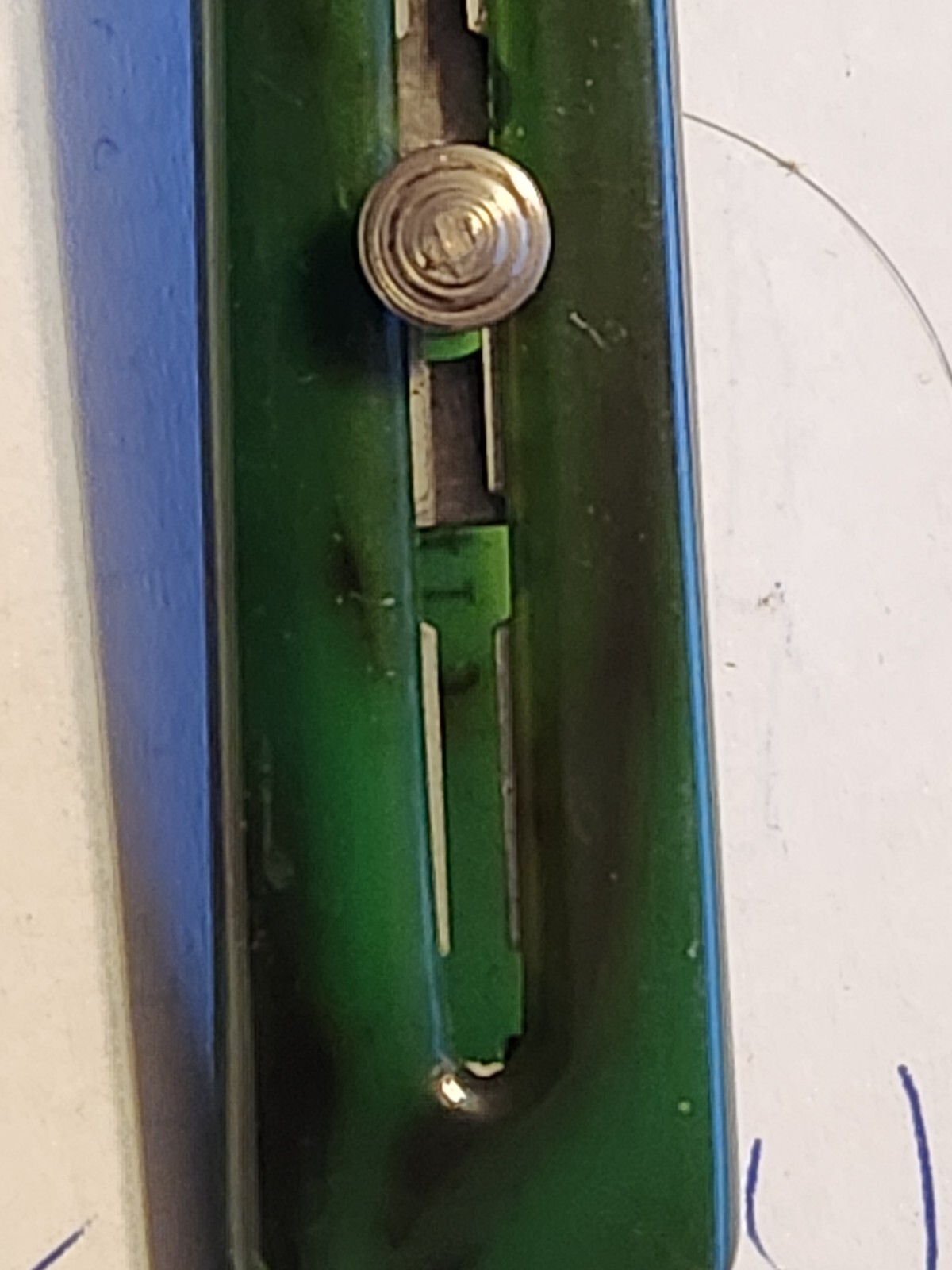 Retractable Nail File Green Plastic Bakelite Celluloid Vintage Advertising Rough