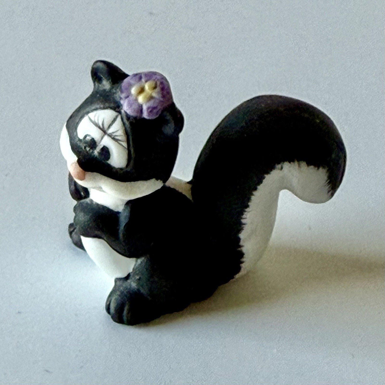 VNTG Mini Porcelain SKUNK Figurine Hand Painted Matte Finish w/Flower Mid-Centur
