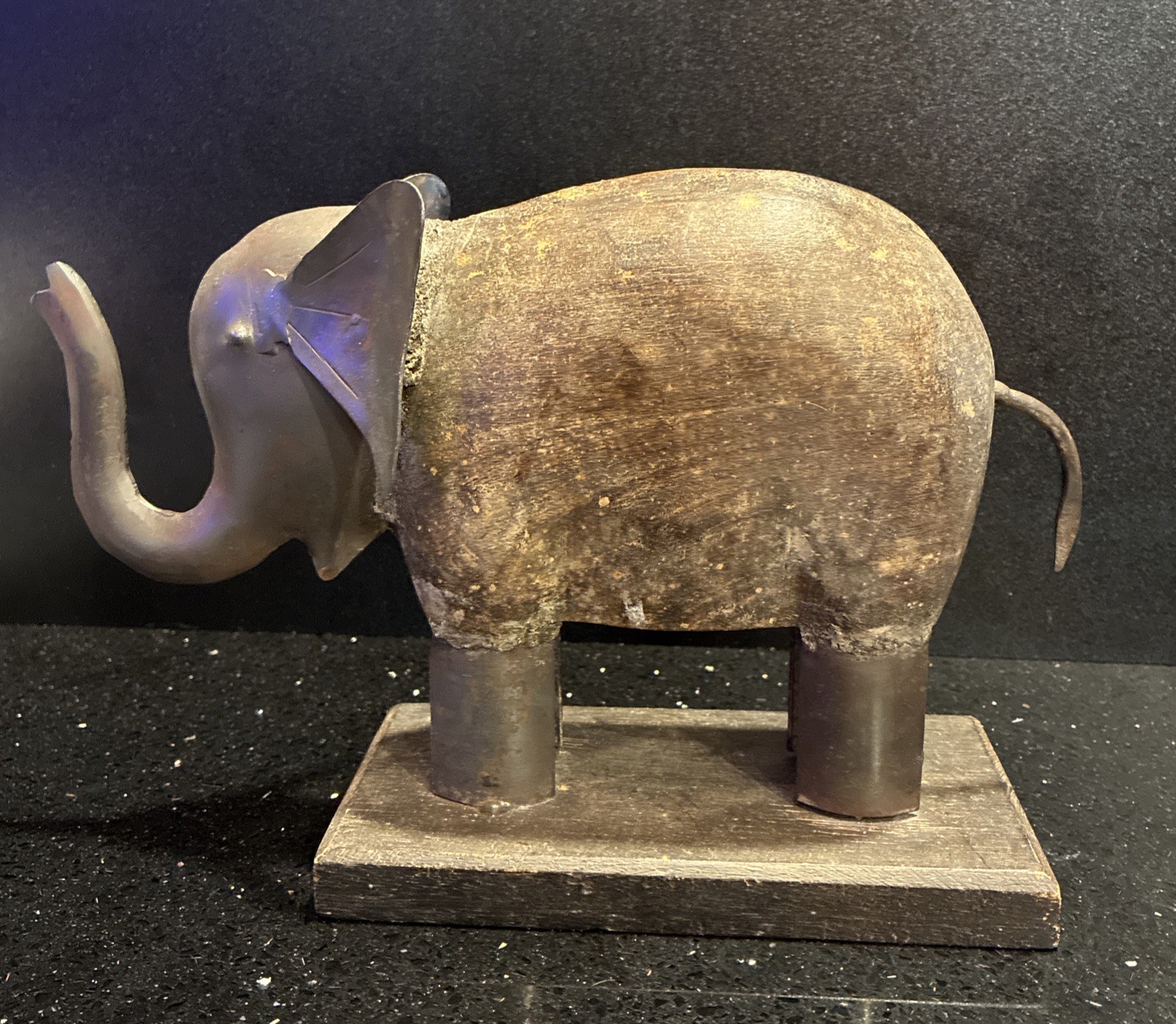 Wooden Metal Elephant Statue 10”exhibits signs of age & handcrafted artistry