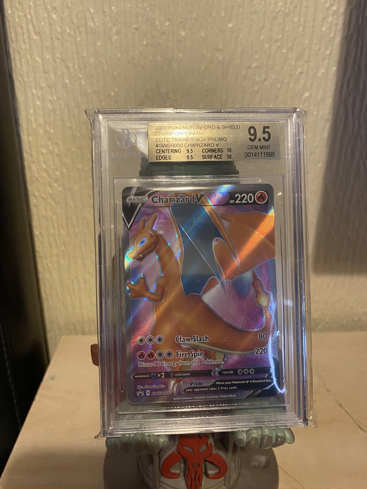 Charizard V – SWSH050 Champion’s Path (Pokemon) – BGS 9.5 Graded Card