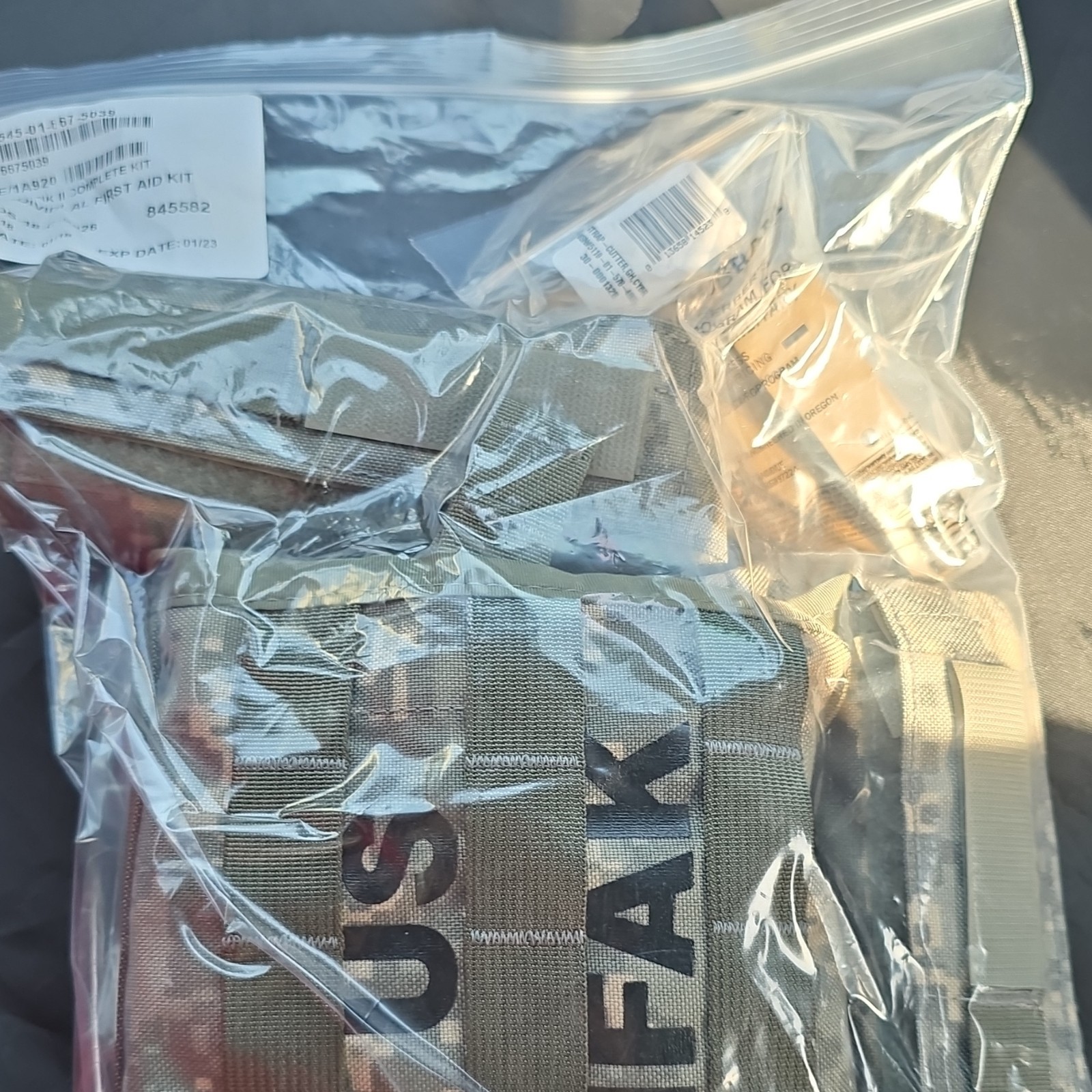 USGI UCP IFAK II Kit (Stocked) w/ TQ Pouches and Strap Cutter EXPIRED 01/23