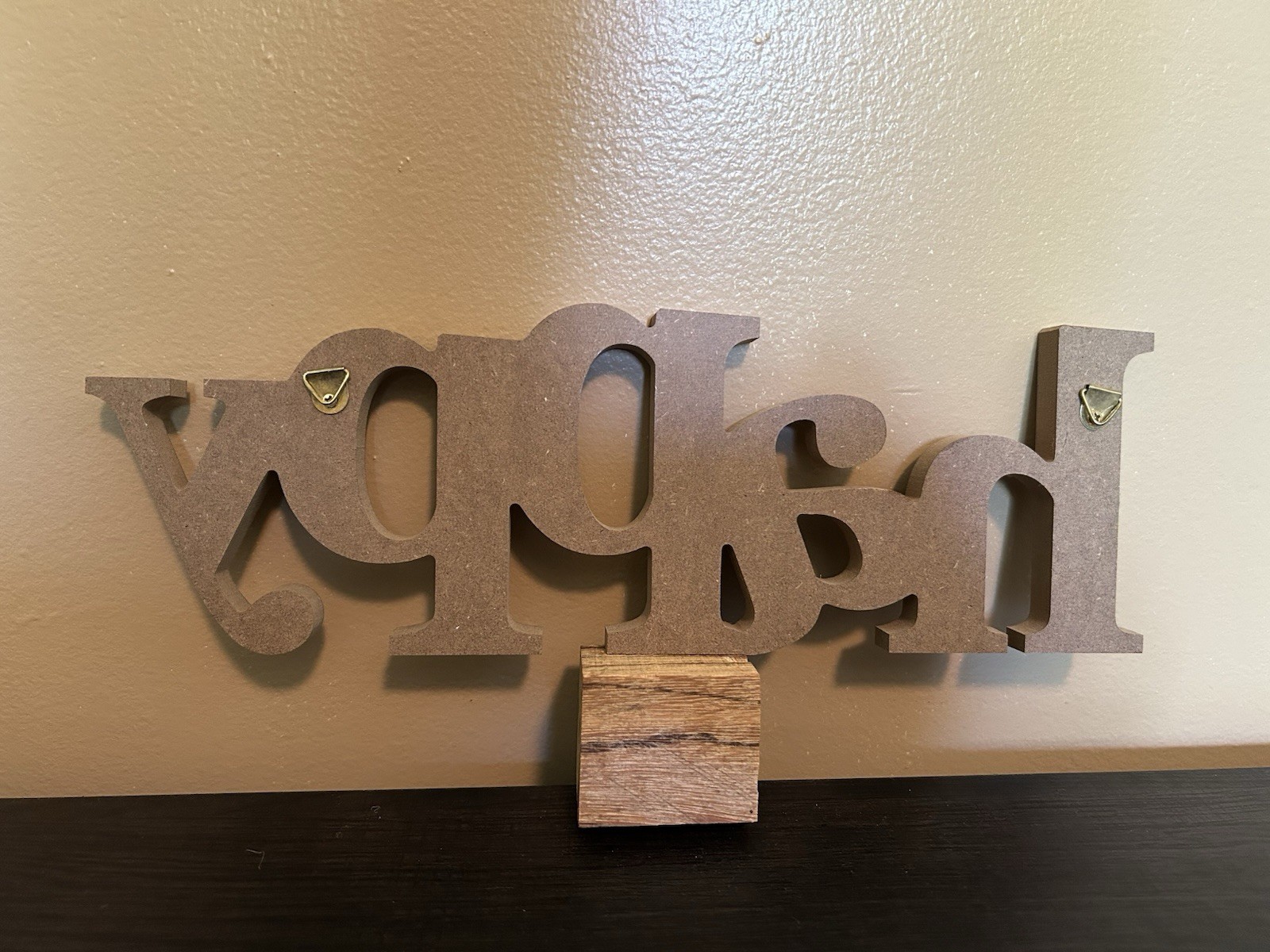 Hanging decorative “happy” wall decor piece. Hooks for hanging.