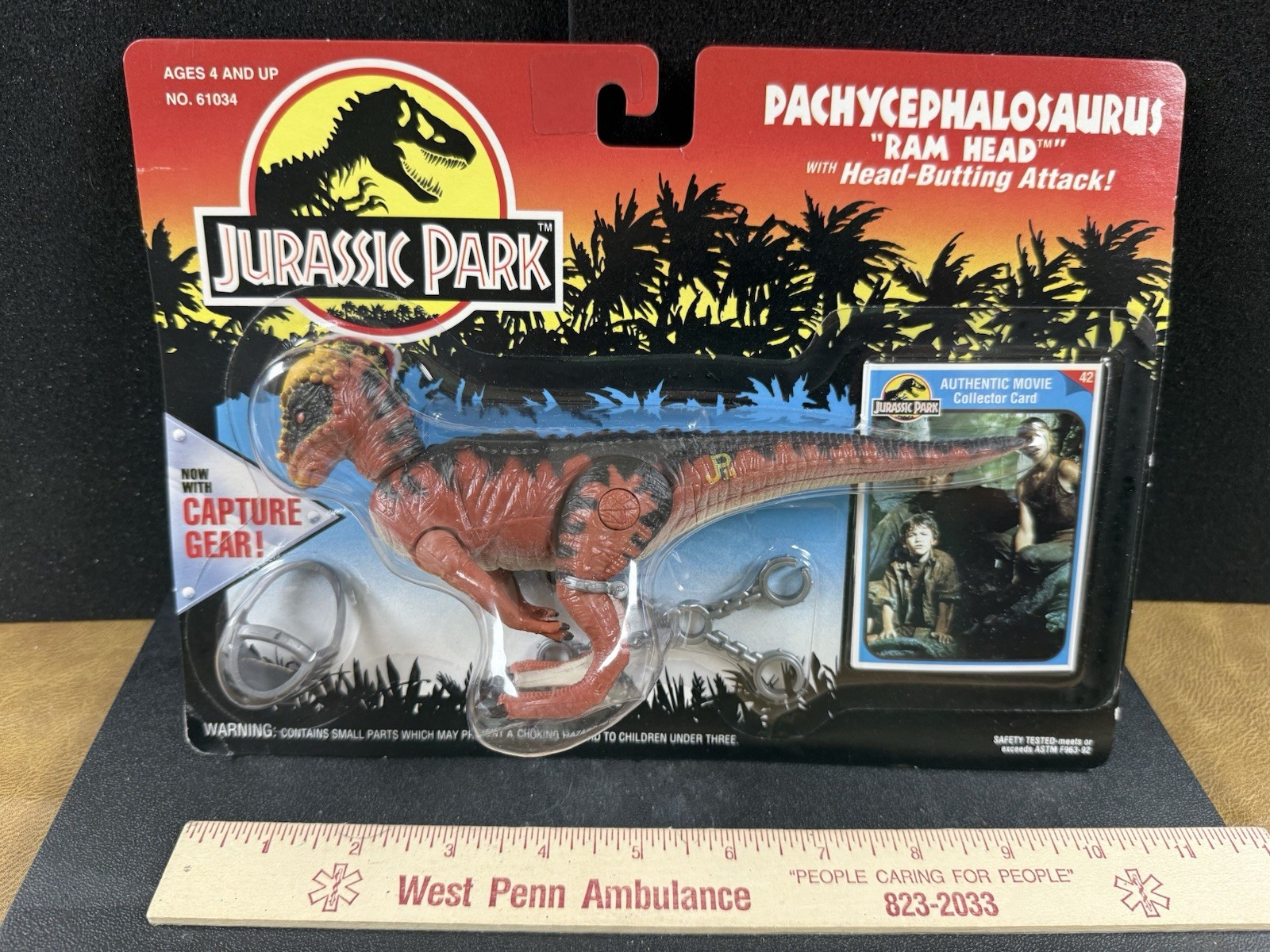 Jurassic Park Dinosaur–Pachycephalosaurus “Ram Head” on card with Capture Gear