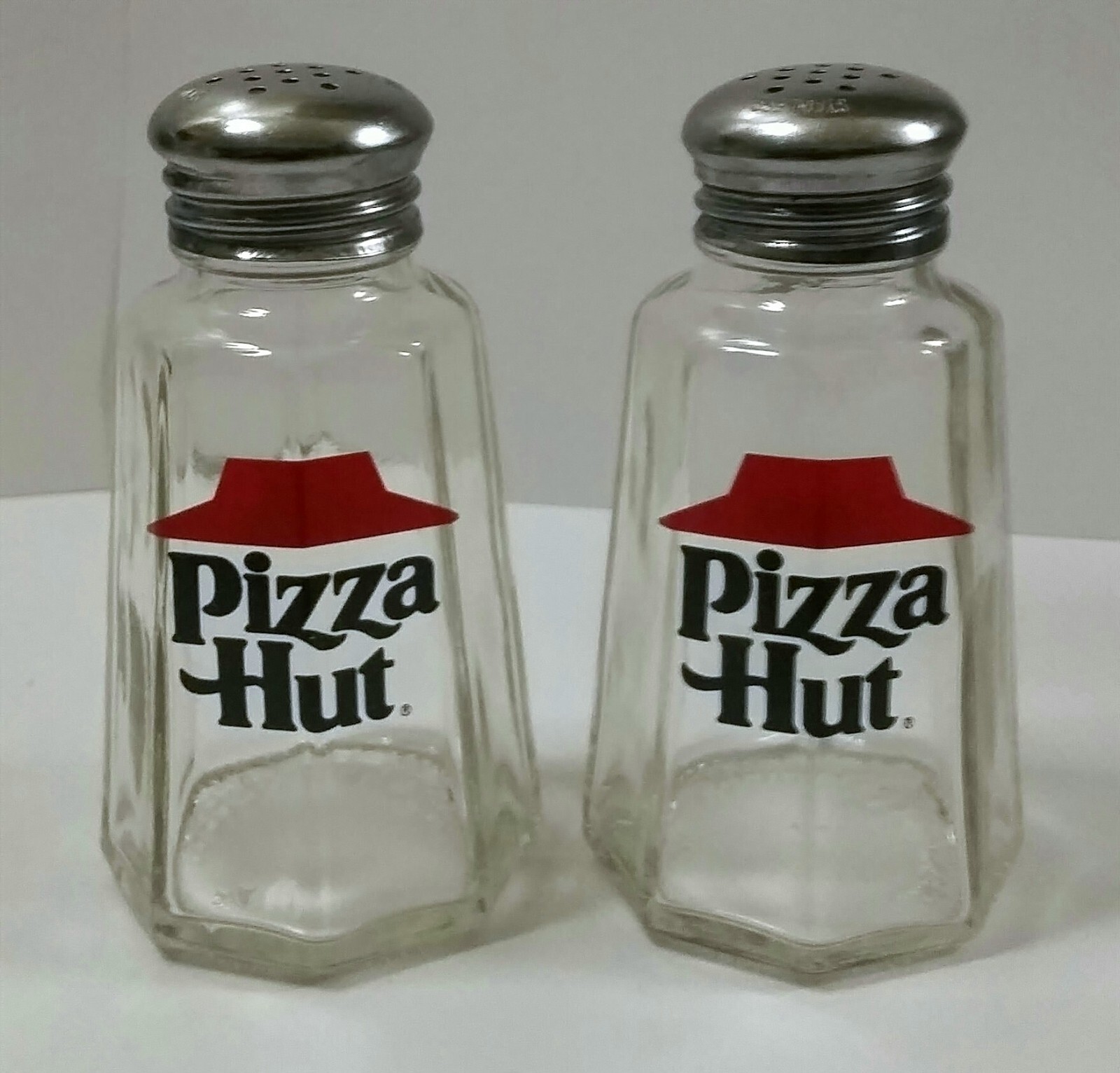 A Nice Set of Pizza Hut Salt & Pepper Shakers 3¾” Tall