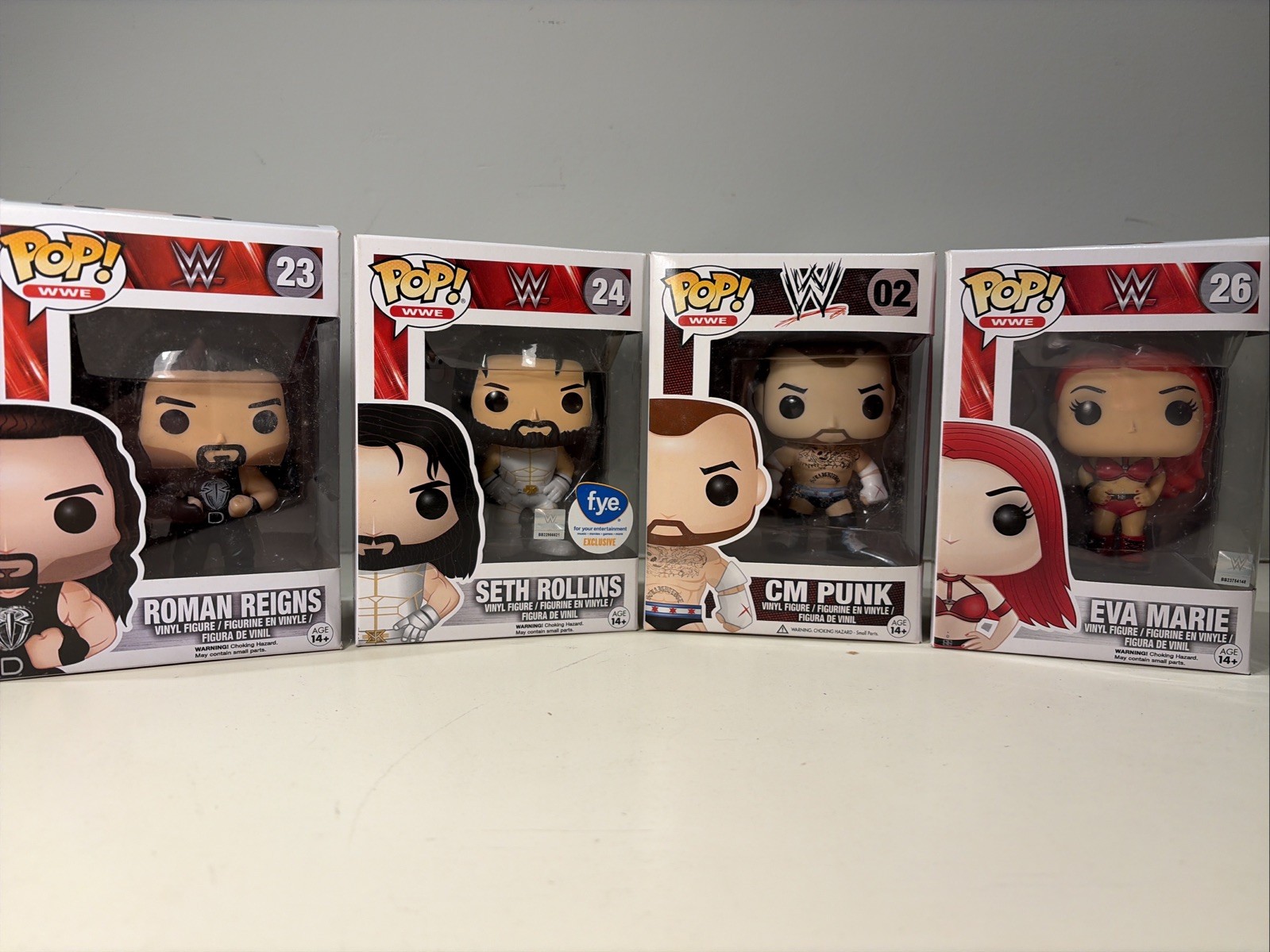 Rare and Retired WWE POP Set of 4 , Roman , Seth , Punk And Eva