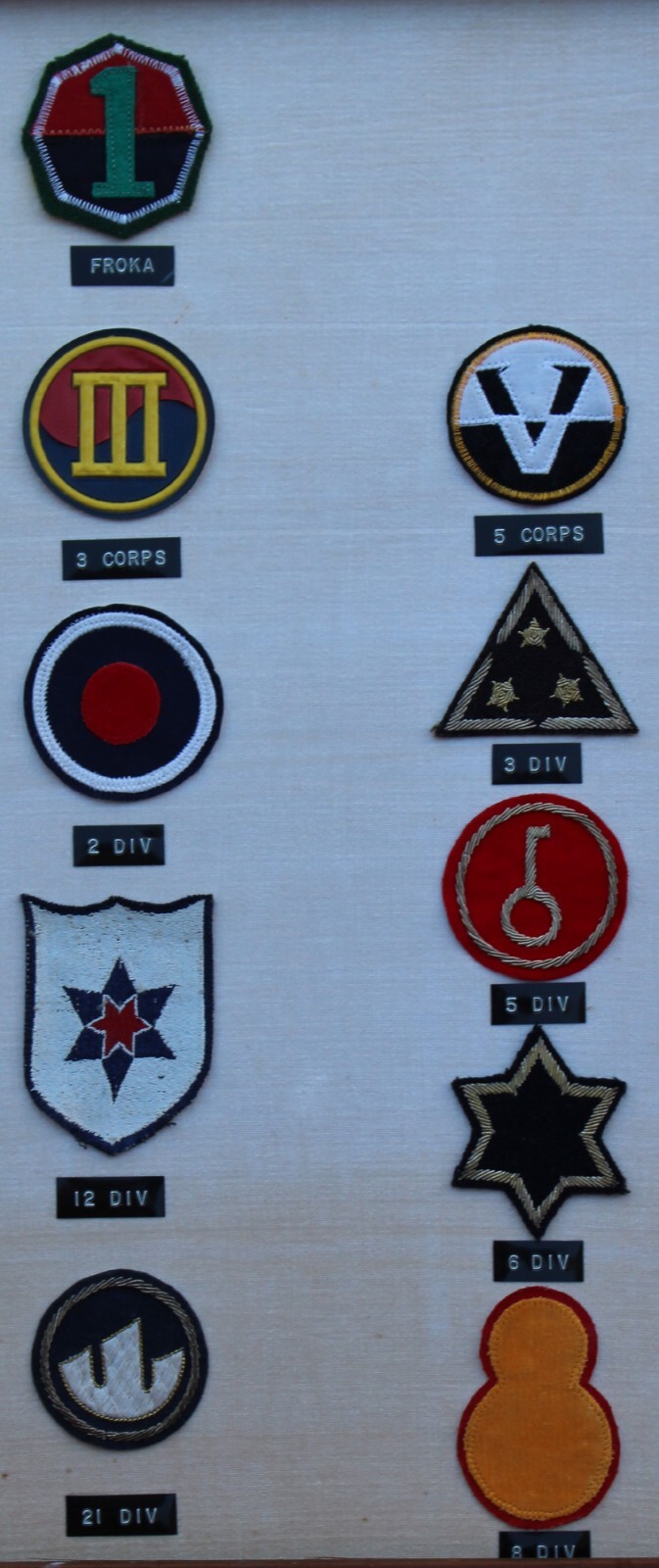 23 REPUBLIC OF KOREA (ROK) DIVISION PATCHES MOUNTED IN A FRAME