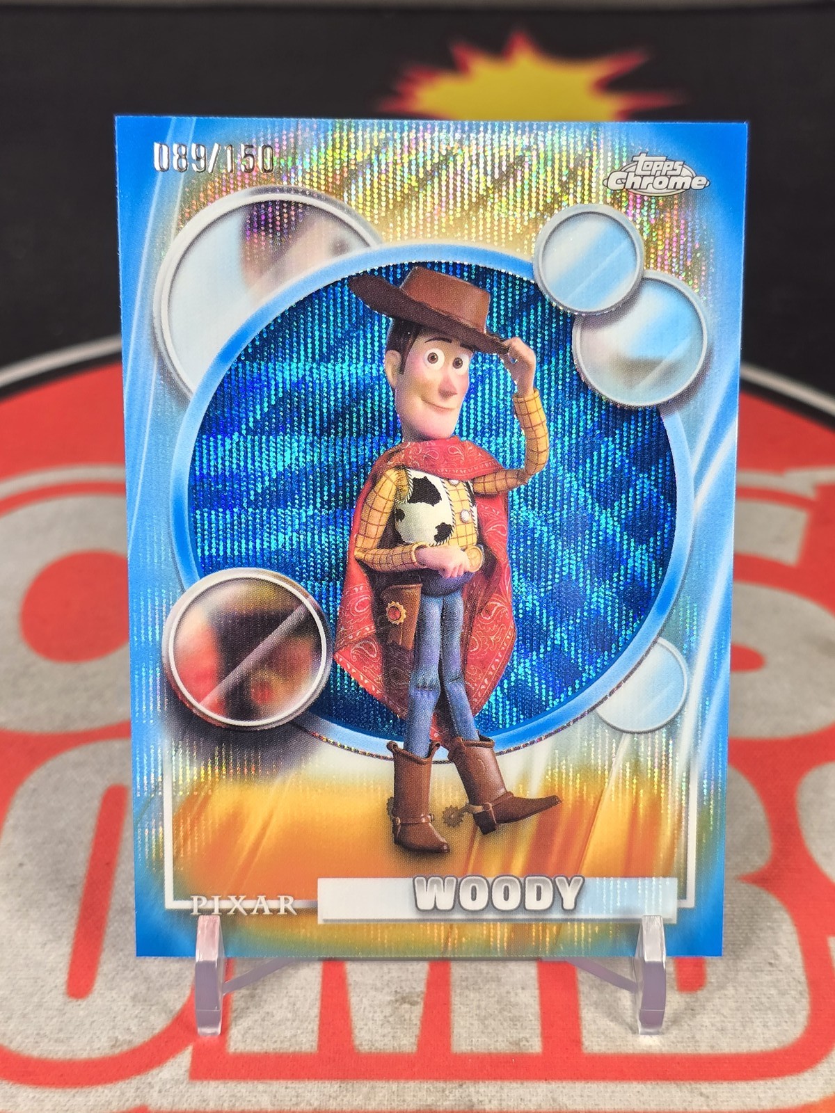 2026 Topps Chrome Disney Woody Blue Wave Refractor /150 #194
