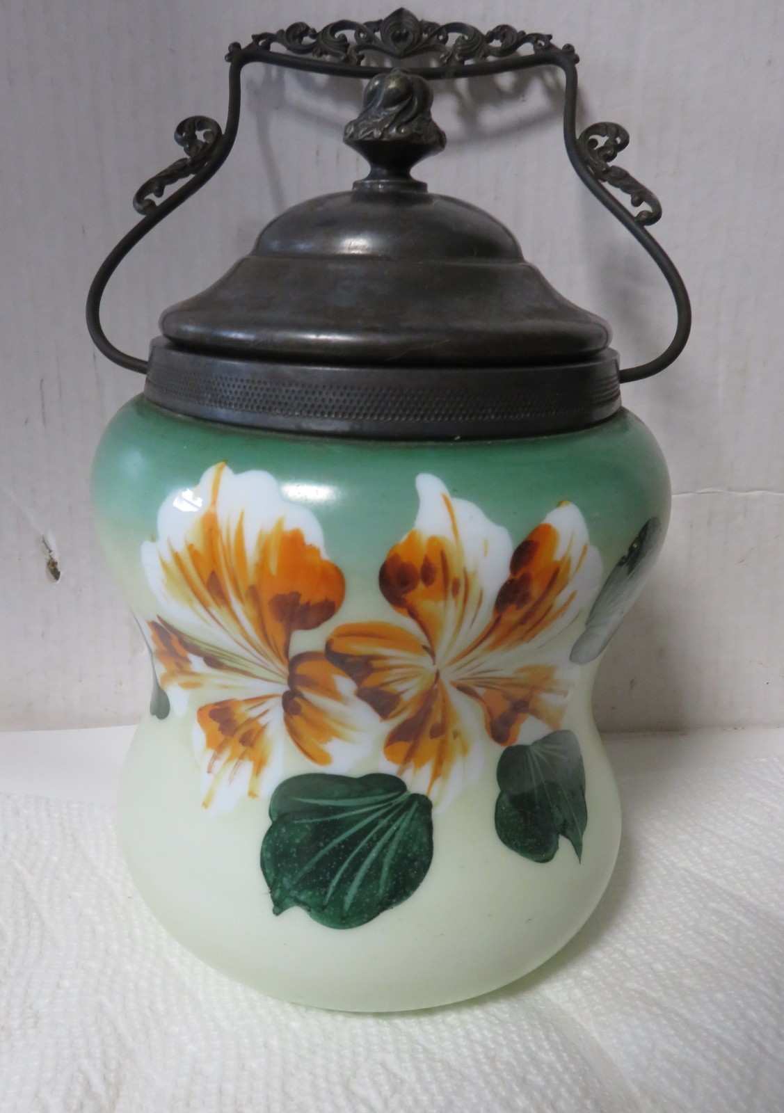 Antique floral decorated Biscuit jar with silver lid and handle