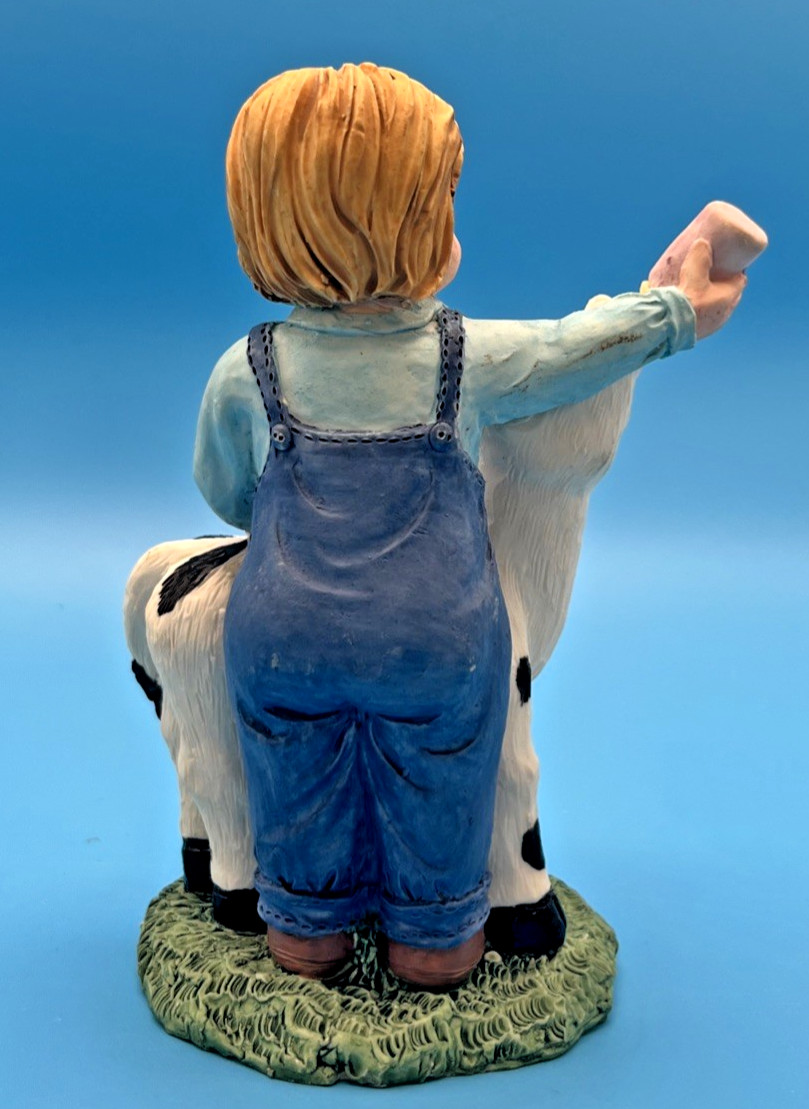 Boy Feeding Baby Cow with bottle Figurine 4.5″ Tall Youngs Inc gift Farm