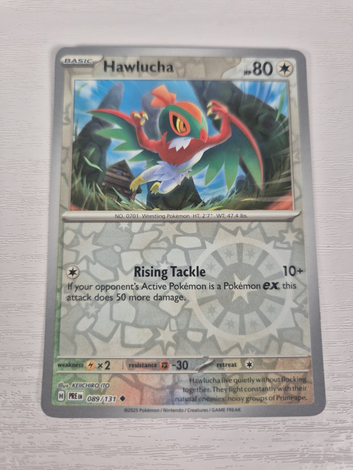 Hawlucha 089/131 – Prismatic Evolutions – Reverse Holo Pokemon TCG – NM