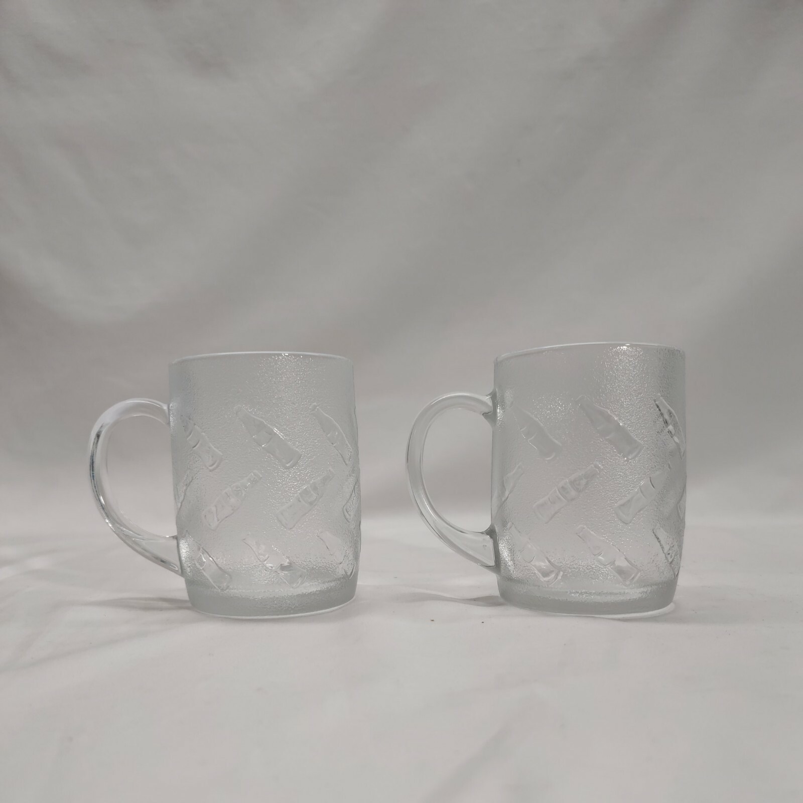 2 Collectible Coca-Cola Embossed Textured Frosted Bottle Logo Mugs Cups Glasses