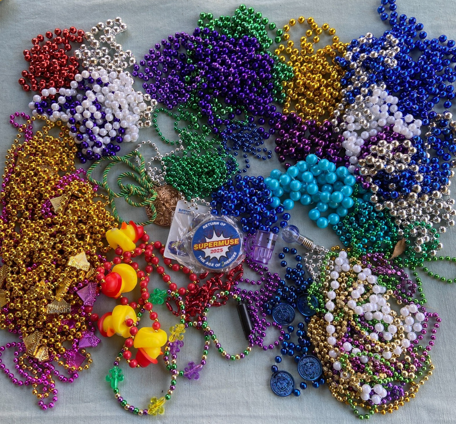 Mardi Gras Beads Cleopatra Rubber Ducks Light Up Muses Super Muse Tucks Chaos