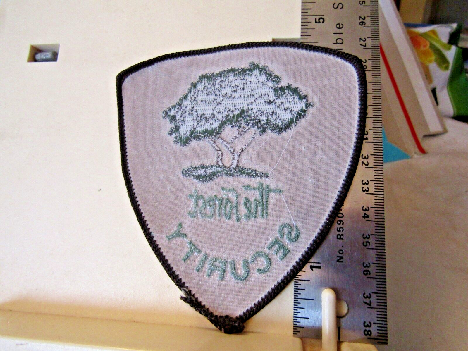 The Forest Security unknown state maybe Chicago Illinois? 4.5″ tall tree logo