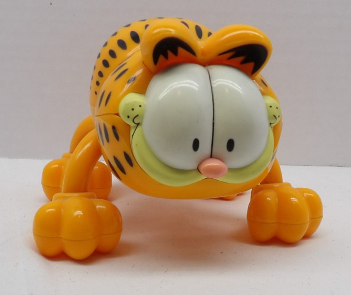 Garfield plastic massager – small orange battery powered vibrating massage