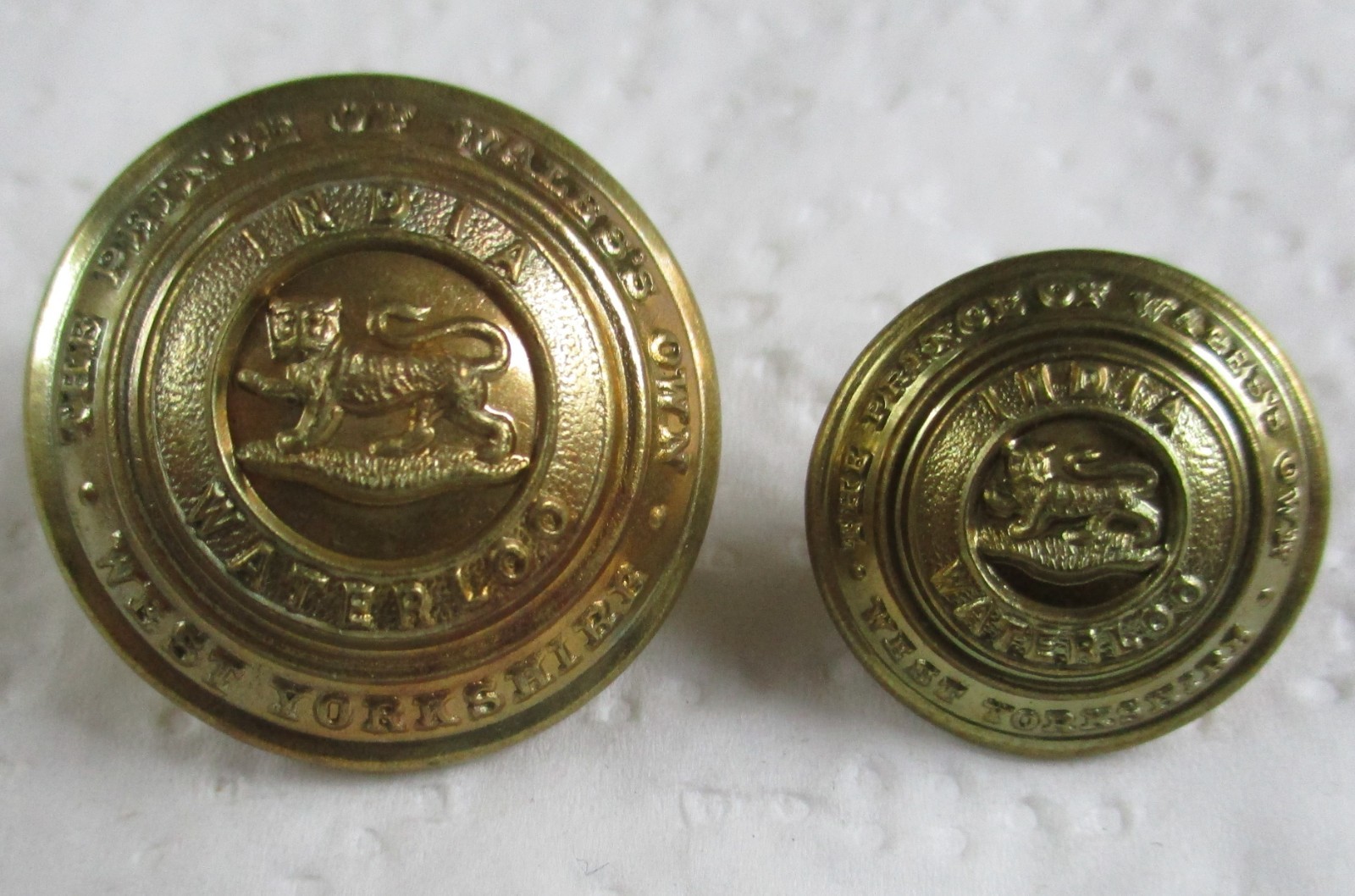 2x WW2 UK Army:”WEST YORKSHIRE REGIMENT BUTTONS”(25mm-17mm, Prince of Wales Own)