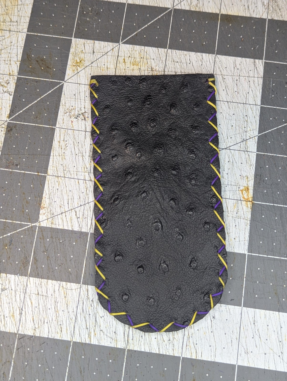 Black Ostrich Print Leather Knife Slip With Yellow And Purple Stitching