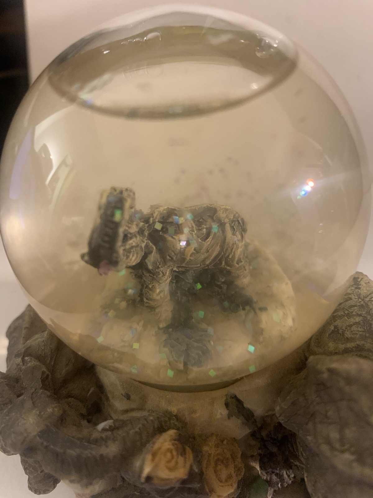 Elephant with Smaller Elephant Inside Globe Figurine