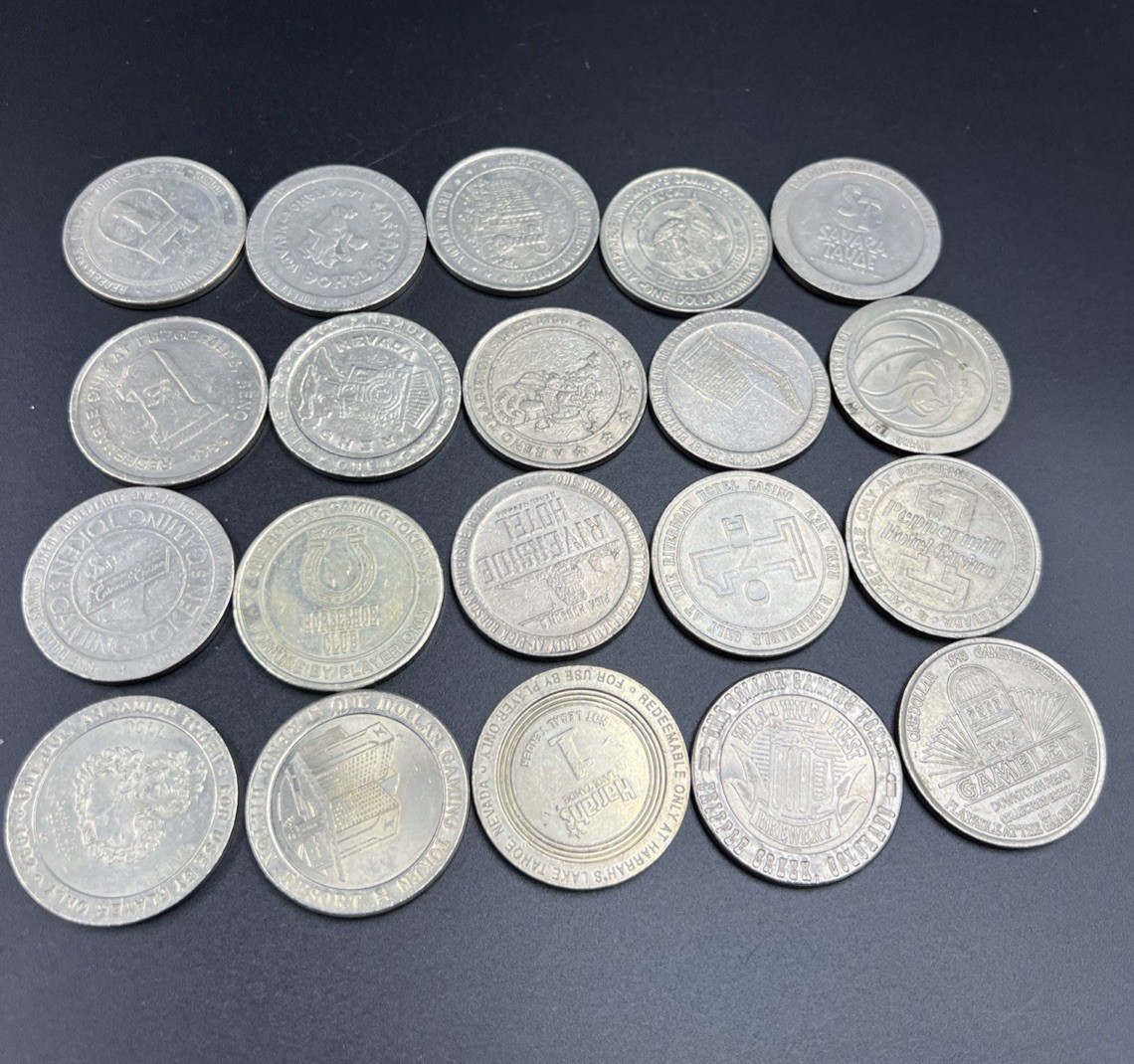 Lot of 20 $1 Casino Dollar Gaming Tokens Metal Circulated Conditions SKU#7521