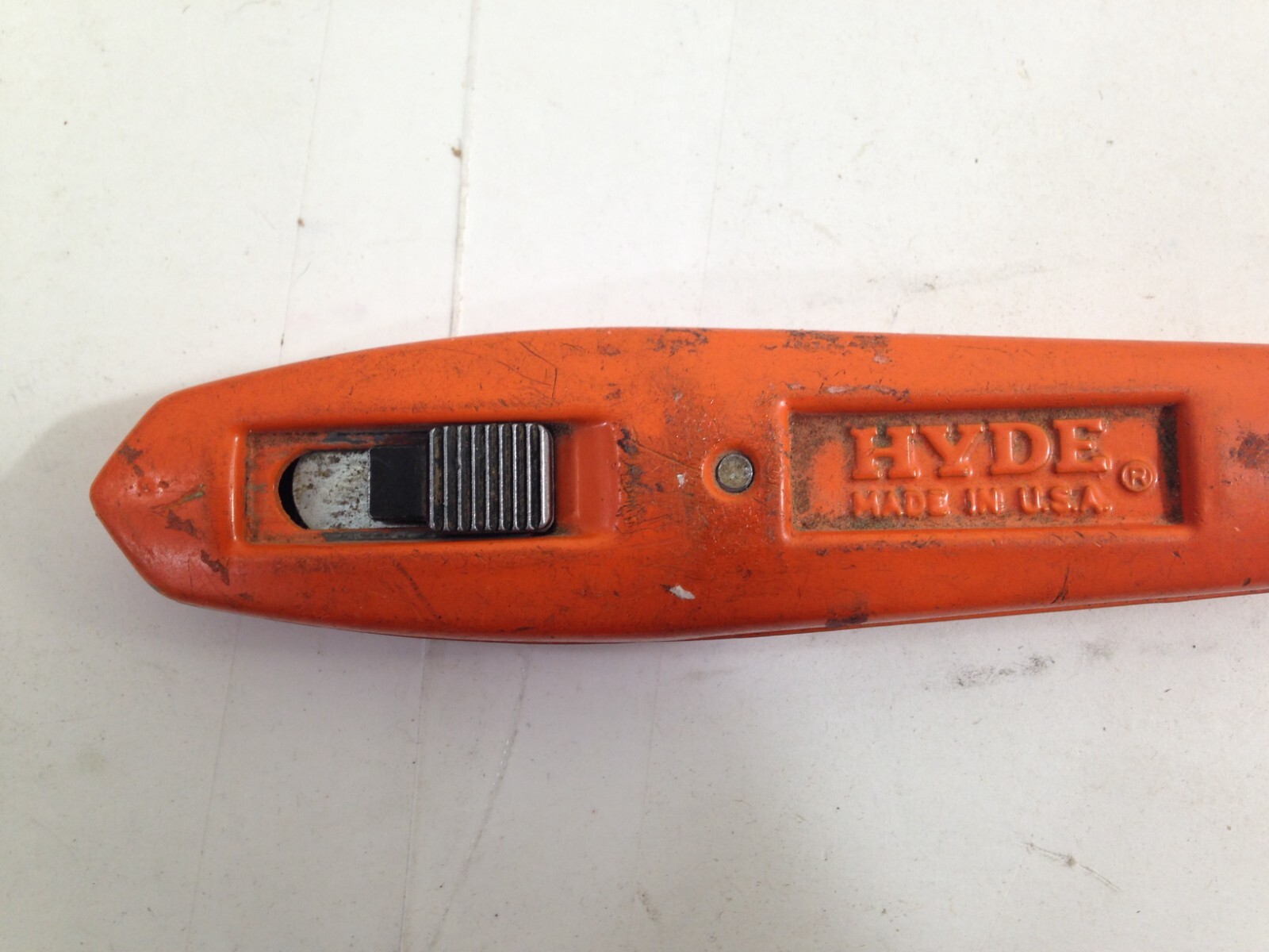AMBIDEXTROUS HYDE UTILITY KNIFE ORANGE SPRING RETRACTABLE PAT 4139939 & 5012581