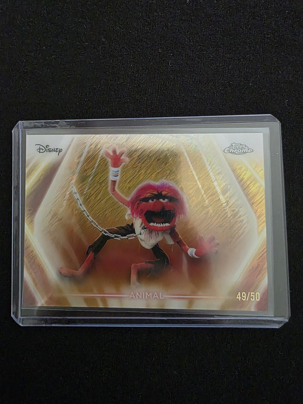 2026 Topps Chrome Disney Neon “Animal” #CNE-194 Gold Shimmer Refractor /50