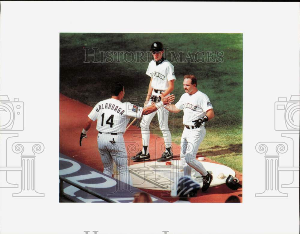 1994 Press Photo Rockies’ Howard Johnson, Andres Gavarrago, teammate after homer