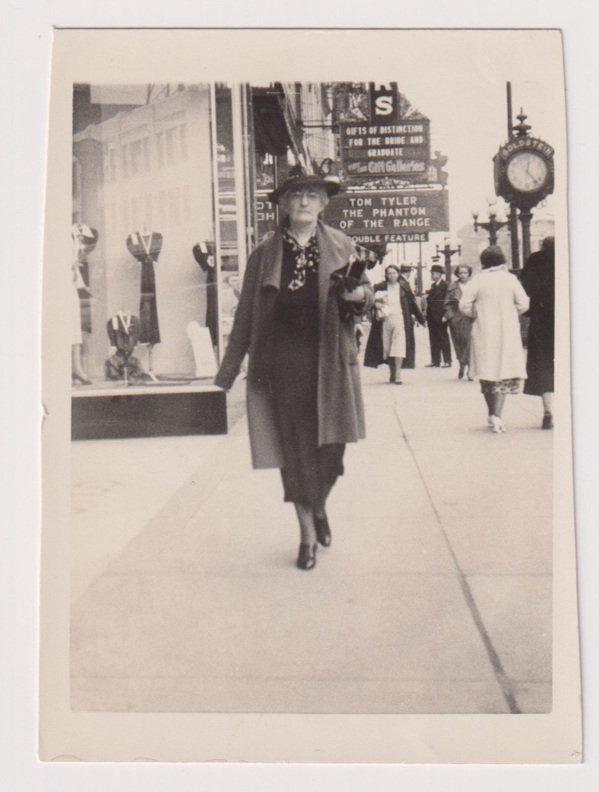 Vintage 1930s–1940s City Street Scene Photo Woman Walking Downtown Theater Signs