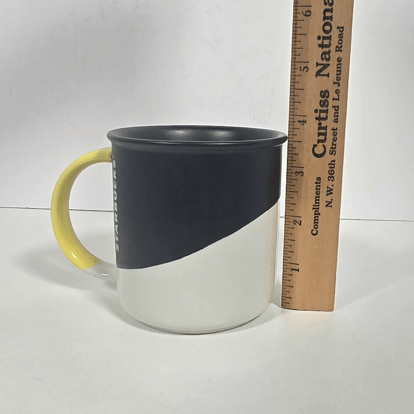 Starbucks Matte Black White Angle Dipped Yellow Handle Coffee Mug 12 oz 2017