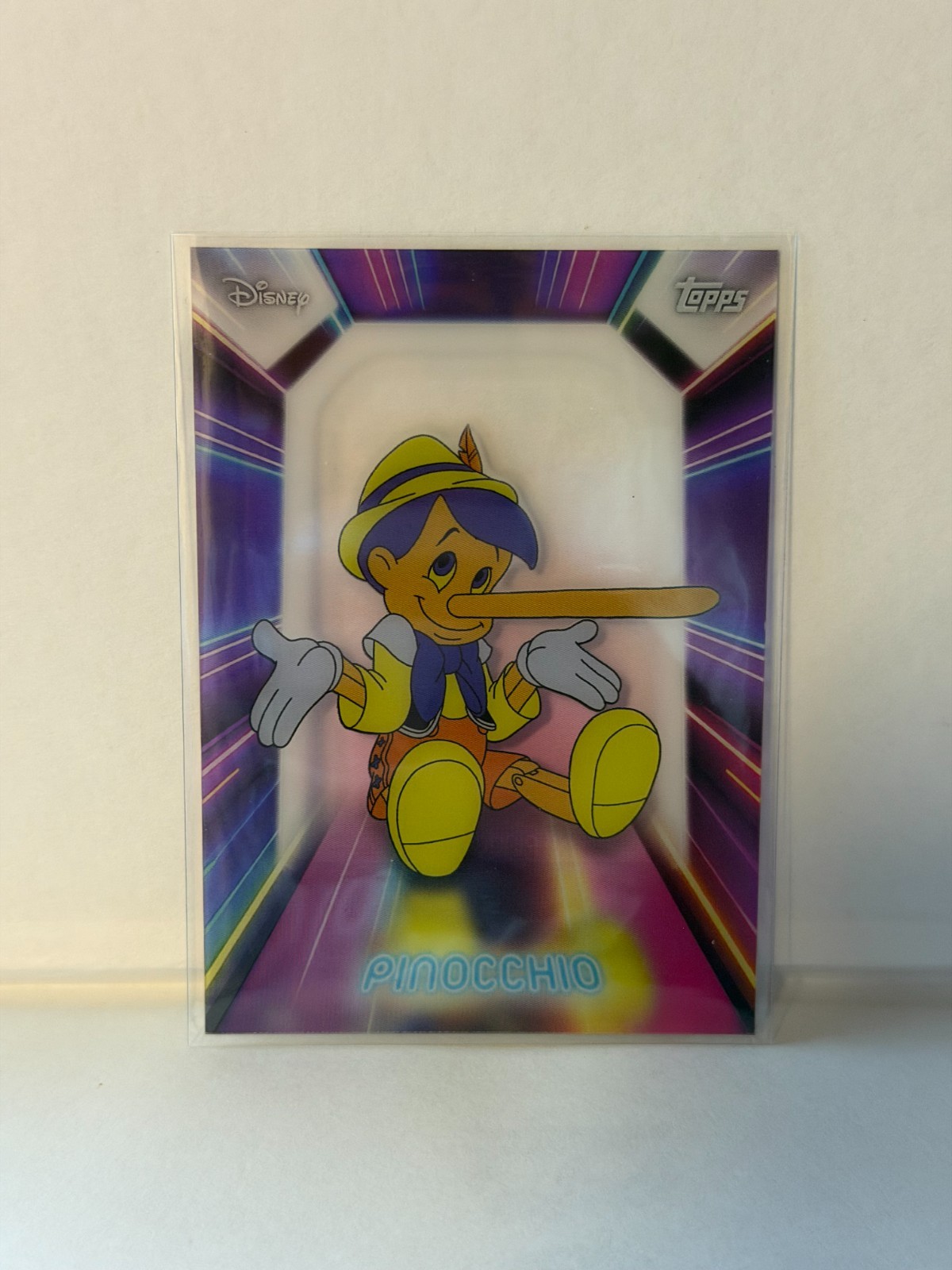 Pinocchio Neon Lights Insert NPL-19 2026 Topps Chrome Disney Illuminated