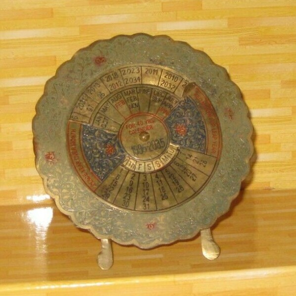 Archana Crafts Intricately Detailed Brass Calendar Wheel W/ Attached Leg Stand