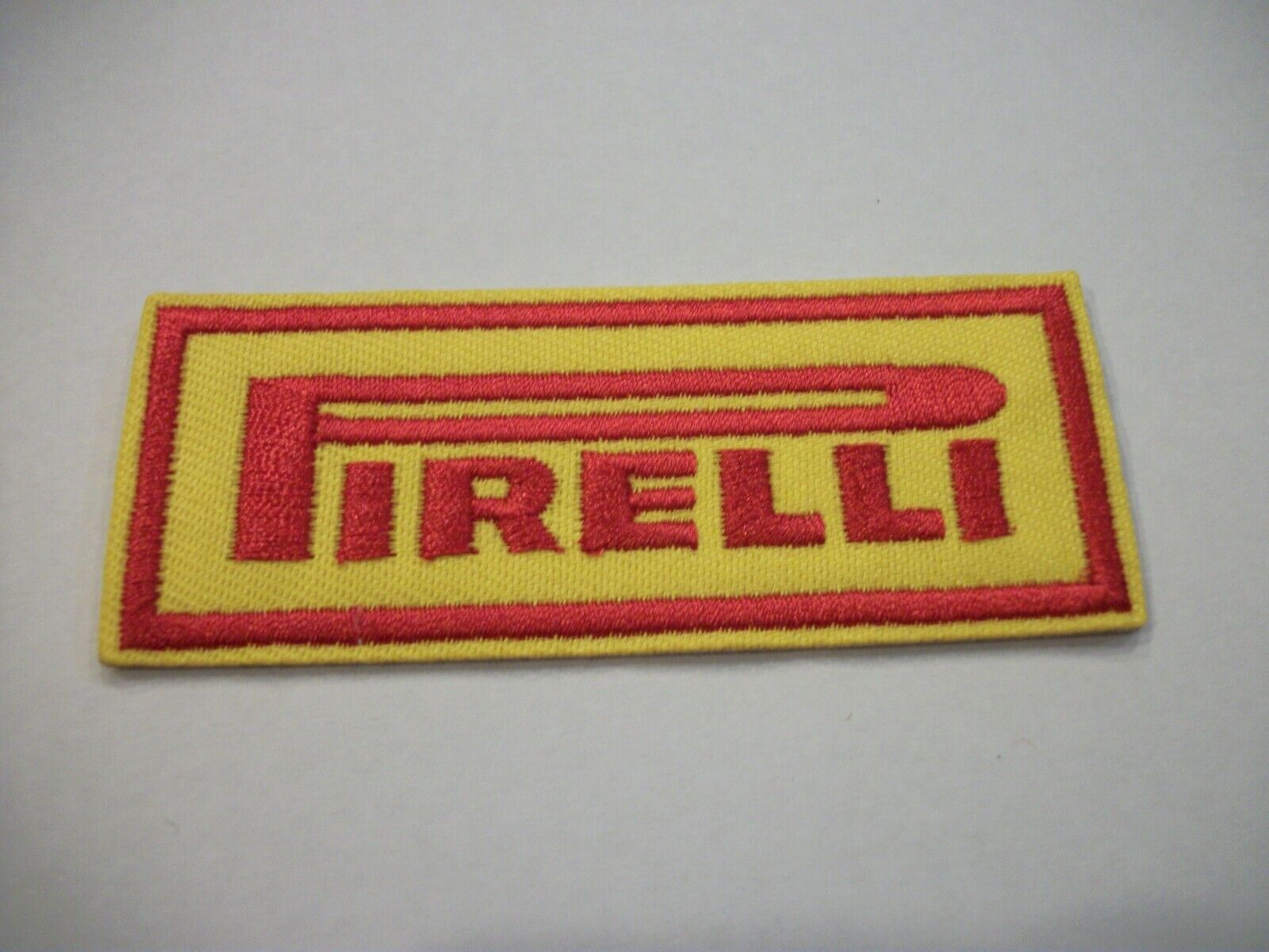 Pirelli Racing Tires~Embroidered Patch~Auto Racing~3″ x 1 1/8″~Iron or Sew on