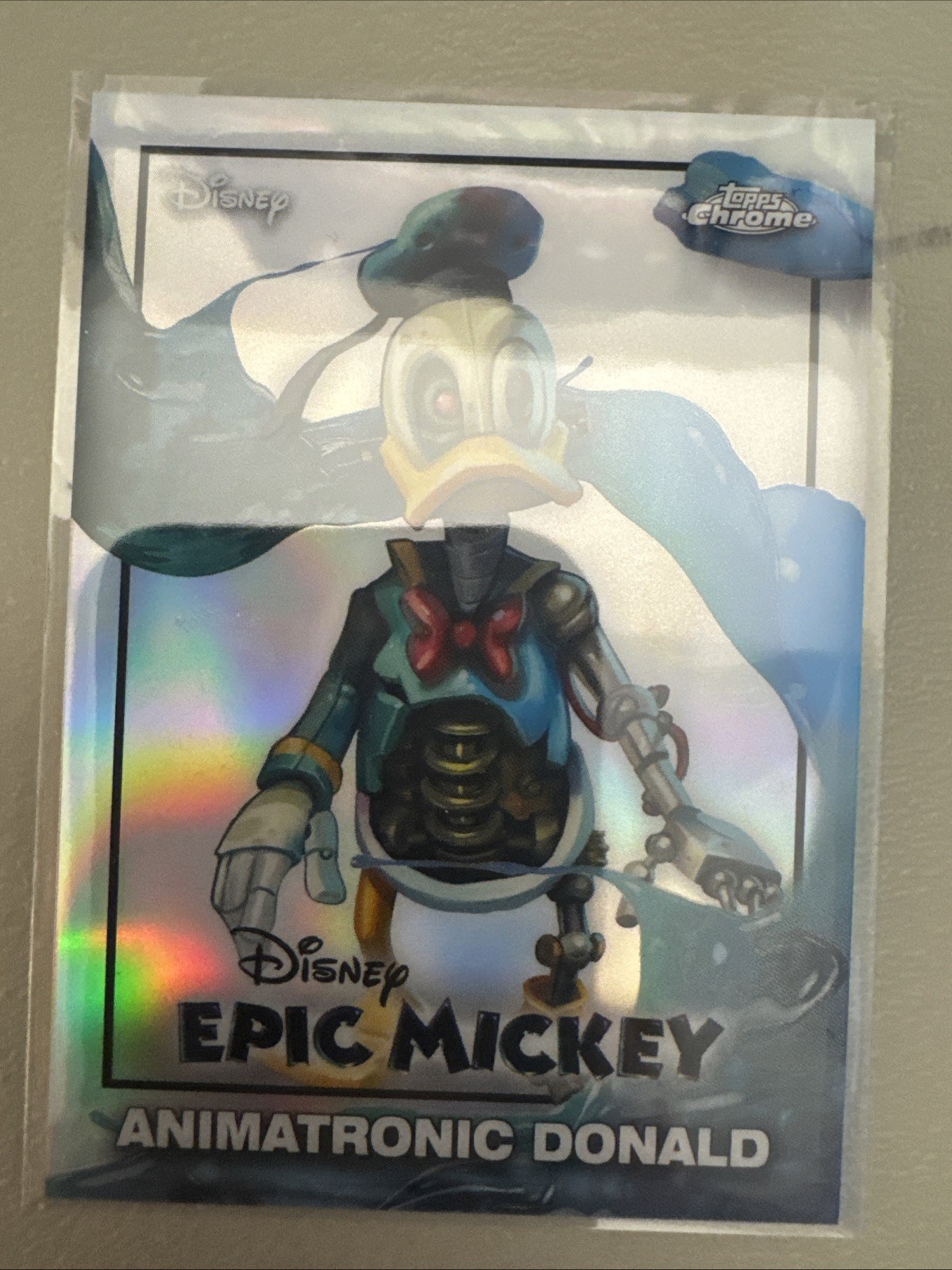 2026 Topps Disney NEON – ANIMATRONIC DONALD – SP EPIC MICKEY Chrome Refractor