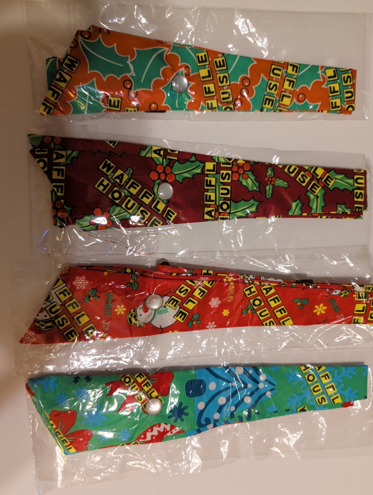 Four Waffle House New Christmas Snap Ties – Red Holly, Red Snowman, Blue Tree