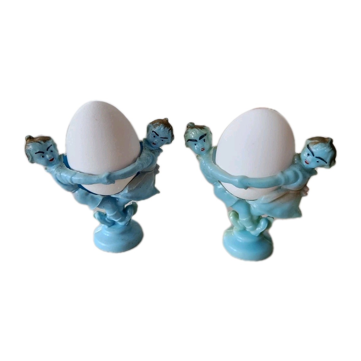 Vintage Plastic Childs EGG CUP / HOLDER Pair Servers Dancing Spinning Children