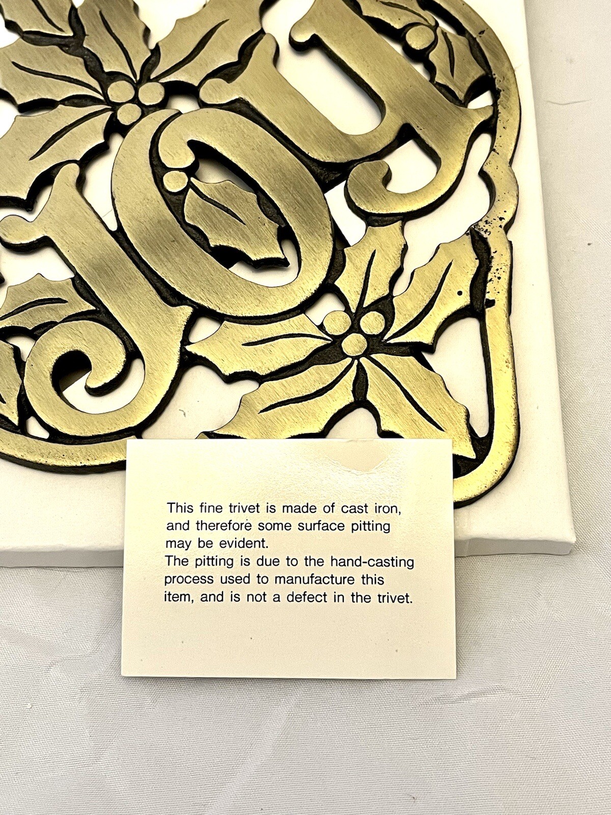 Avon Cast Iron Brass Finish “Holly & Joy” Holiday Christmas Trivet, NIB Vintage