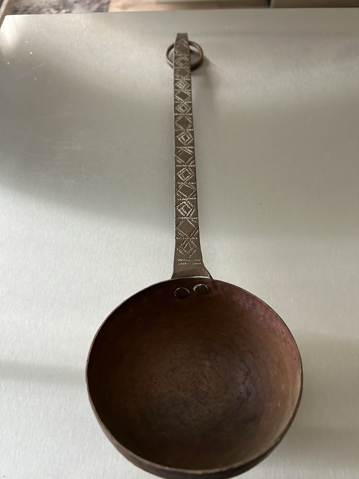 18” antique hand-forged copper ladle with a long 13” decorated iron handle