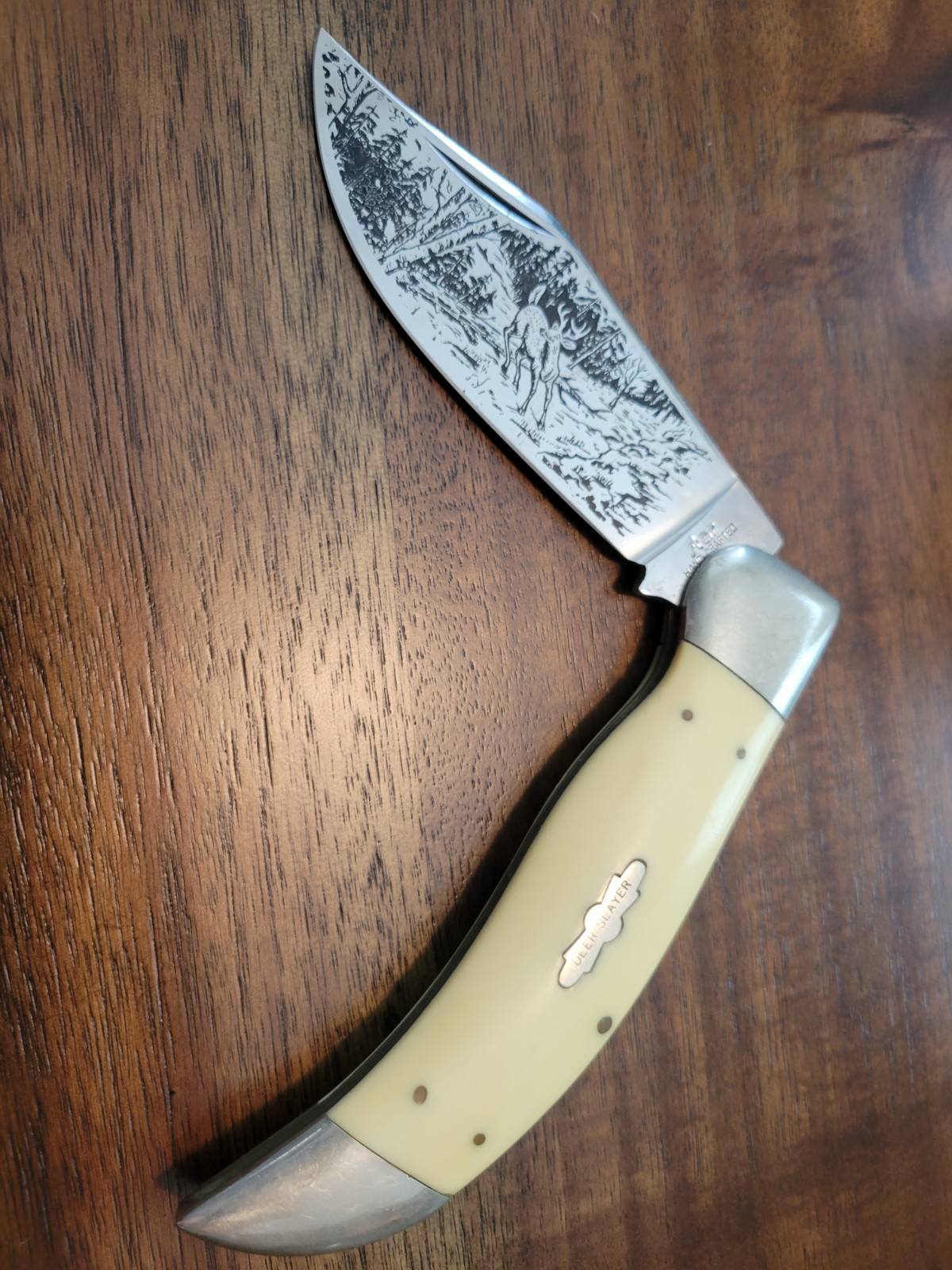 The Slip joint by STAR Features Satin Finished Blade. Nail, Nick Etched Scene.