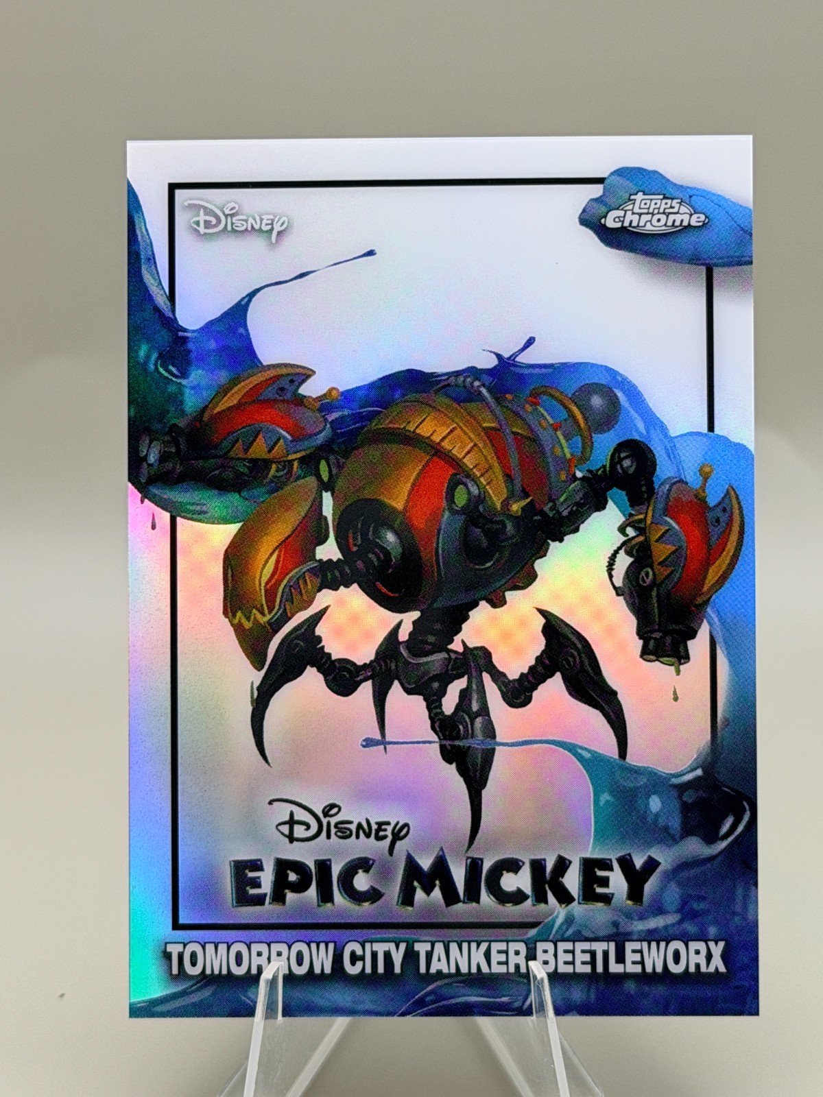 2026 Topps Disney Chrome Neon: EM-8 EPIC MICKEY Tomorrow City Tanker Beetleworx