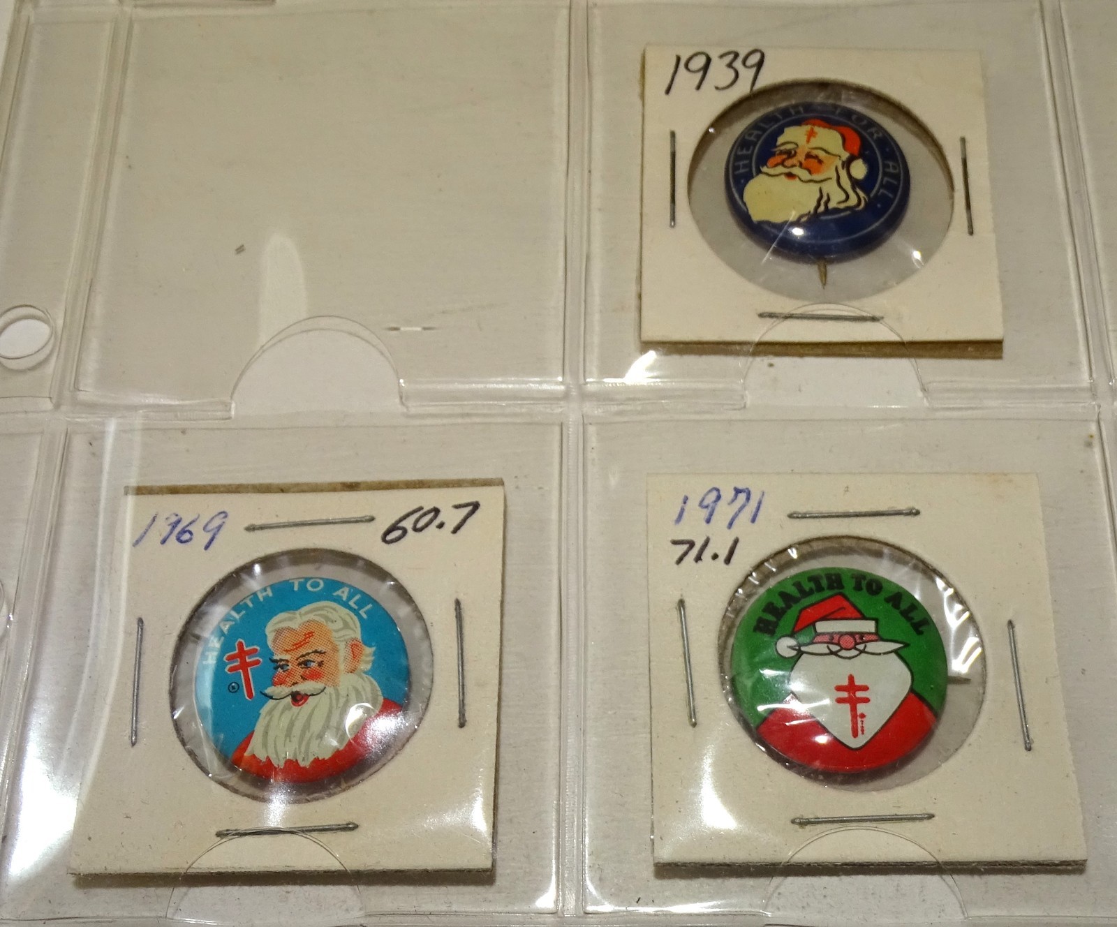 Christmas Seals Pinback buttons % Tabs (12 items) 1930s-1970s (Santa Claus)