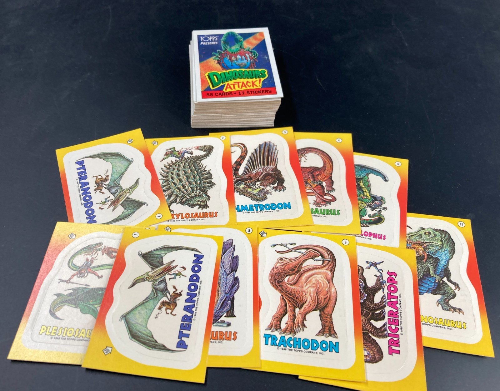 1988 Dinosaurs Attack Topps Full Set. 55 Cards and 11 Stickers. Near Mint