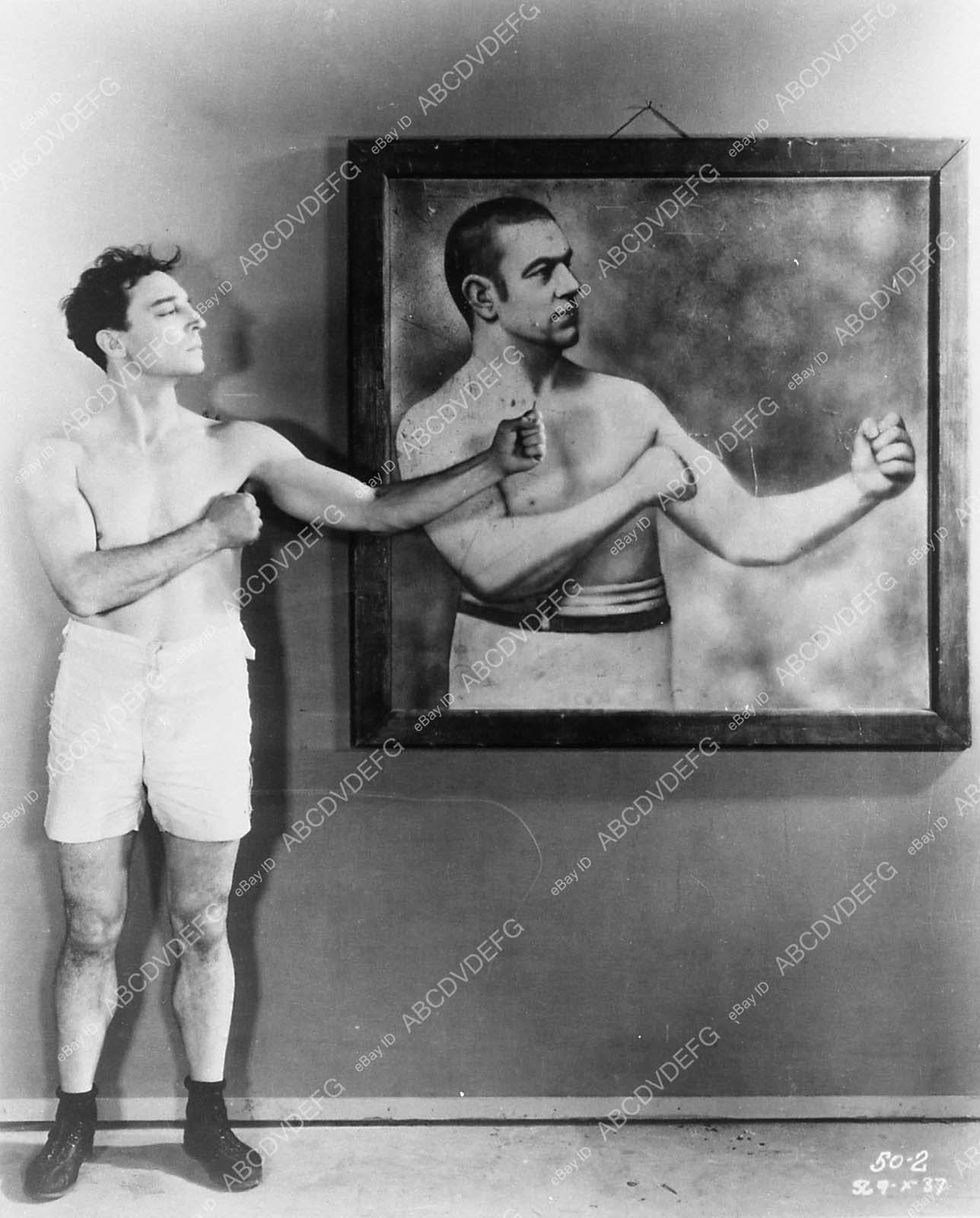 Buster Keaton compares physique to professional boxer 3899-23 – 3899-023