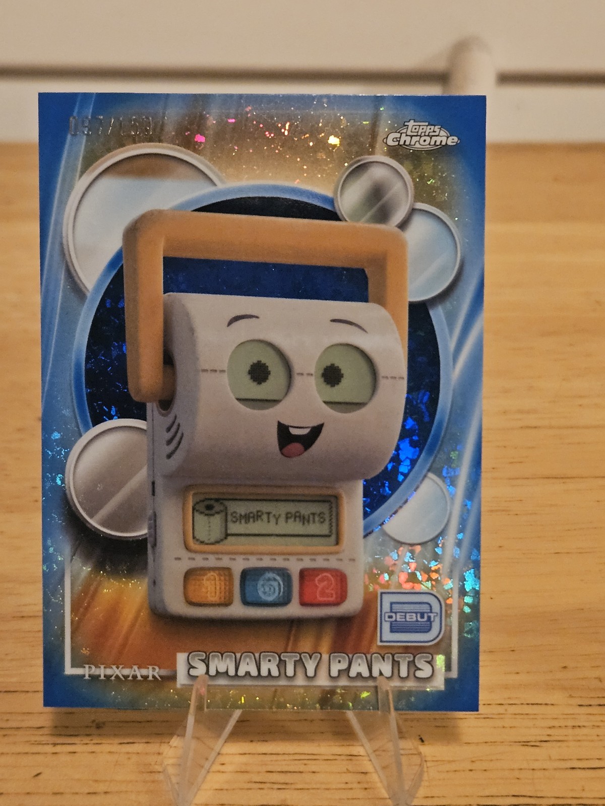 Topps Chrome Disney Pixar 2026 Debut Smarty Pants #198. 97/150 Blue Minidiamond
