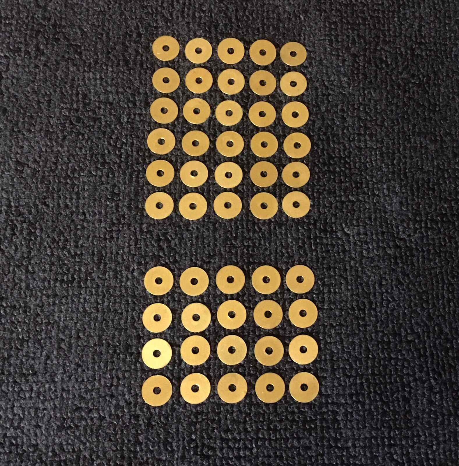 60 Brass inside pivot thrust washers custom made for straight razor restoration.