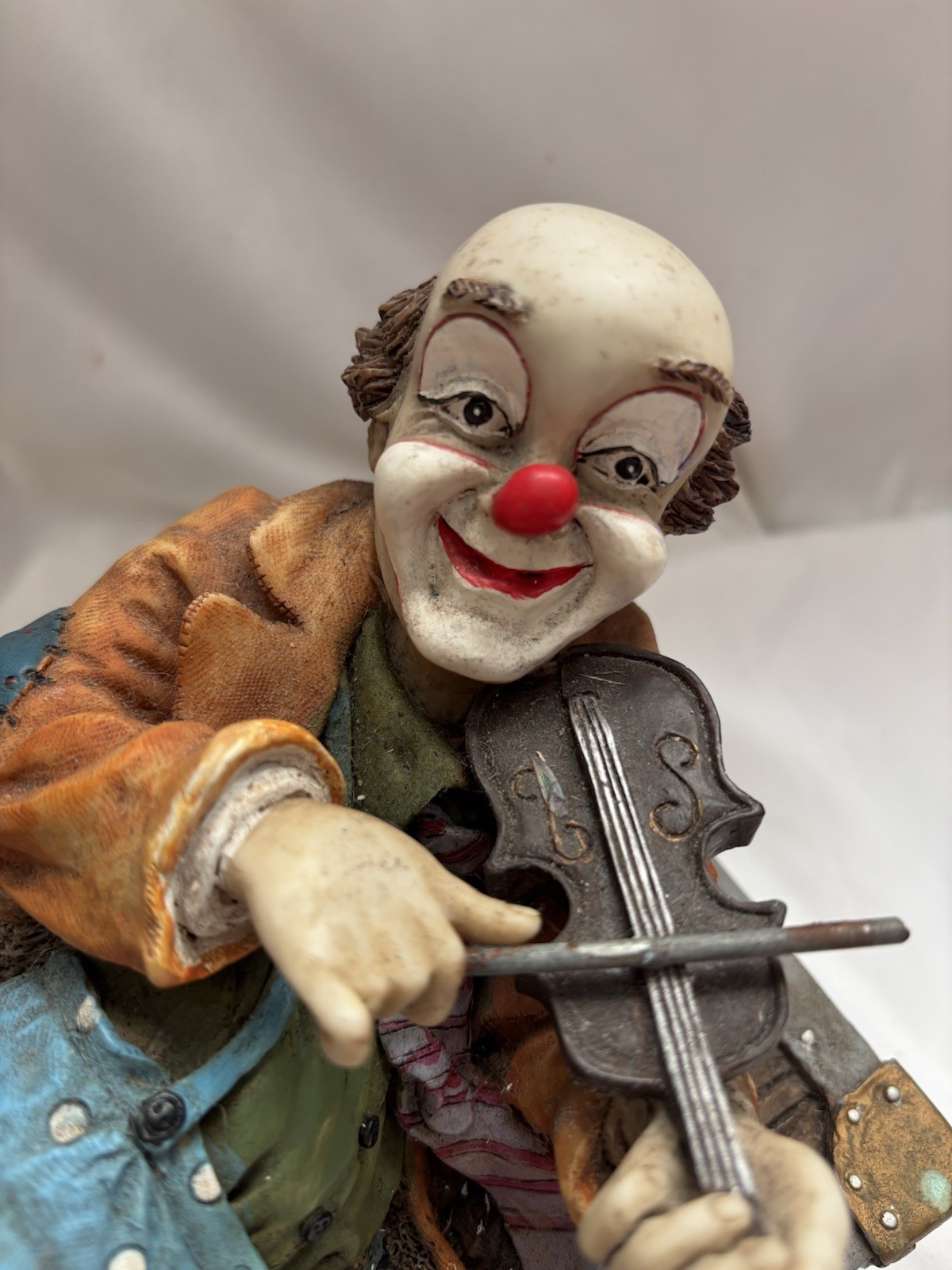 Surreal Clown playing the violin on Suitcase Resin Display Colorful One Piece