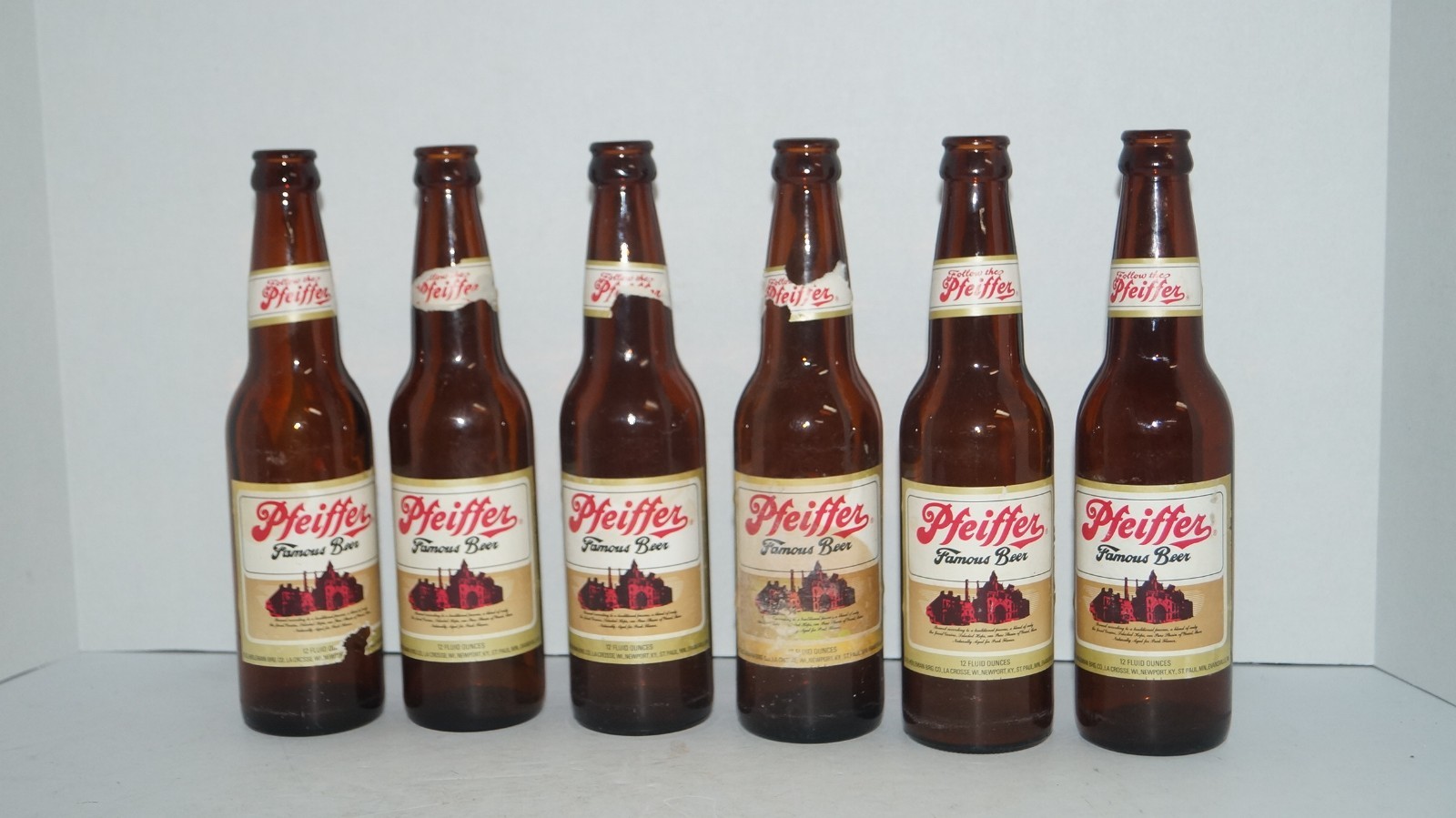 VINTAGE LOT OF SIX 1975 ’77 & ’78 PFEIFFER FAMOUS BEER 12 FL OUNCES GLASS BOTTLE